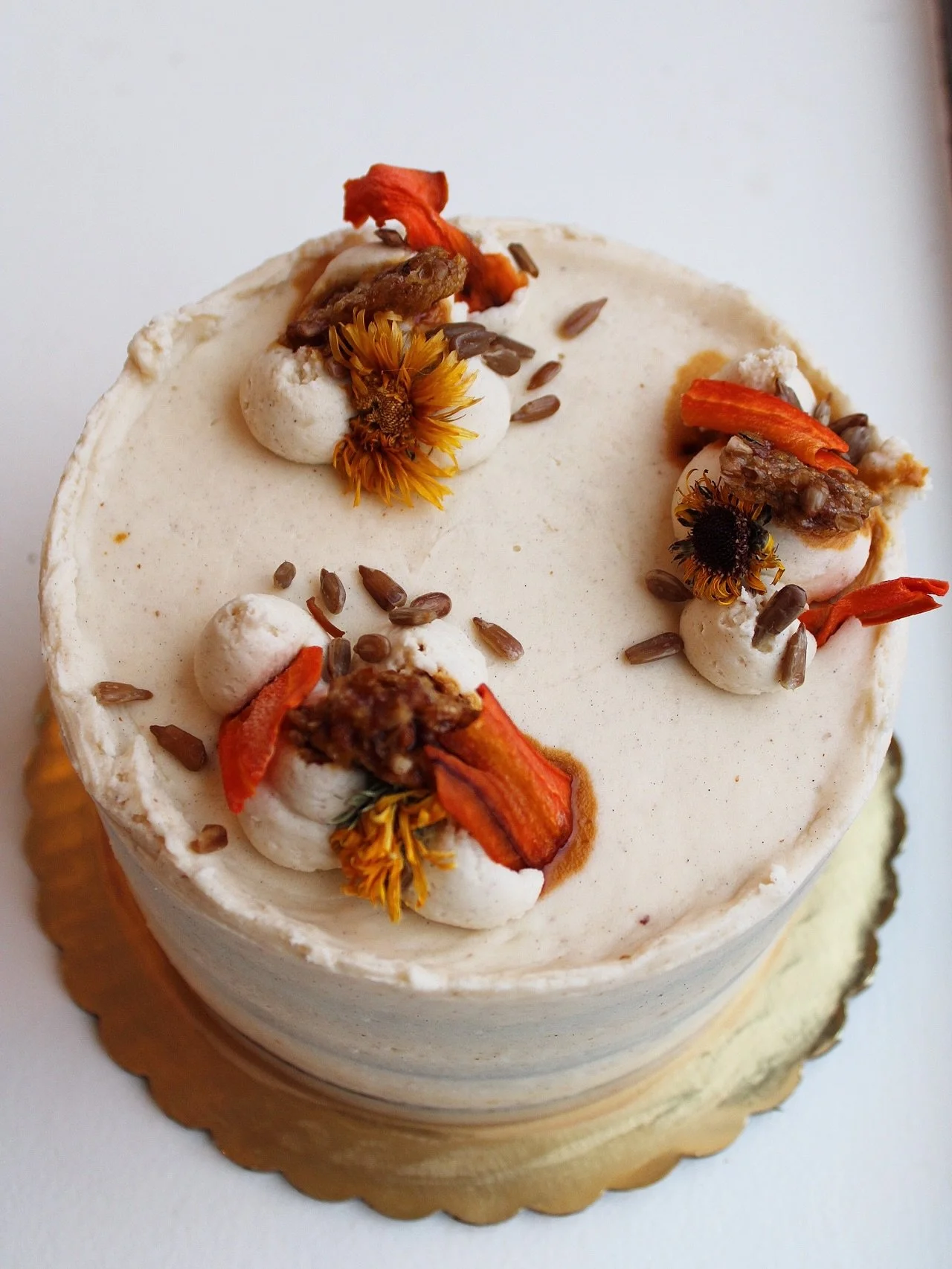 Carrot and cardamom are a natural pair where earthy sweetness meets warm spice, and sunbutter cream brings a richness that ties it all together. 

Our carrot cardamom sunbutter layer cake can be enjoyed by the slice or as a 6&rdquo;&rdquo; whole in o