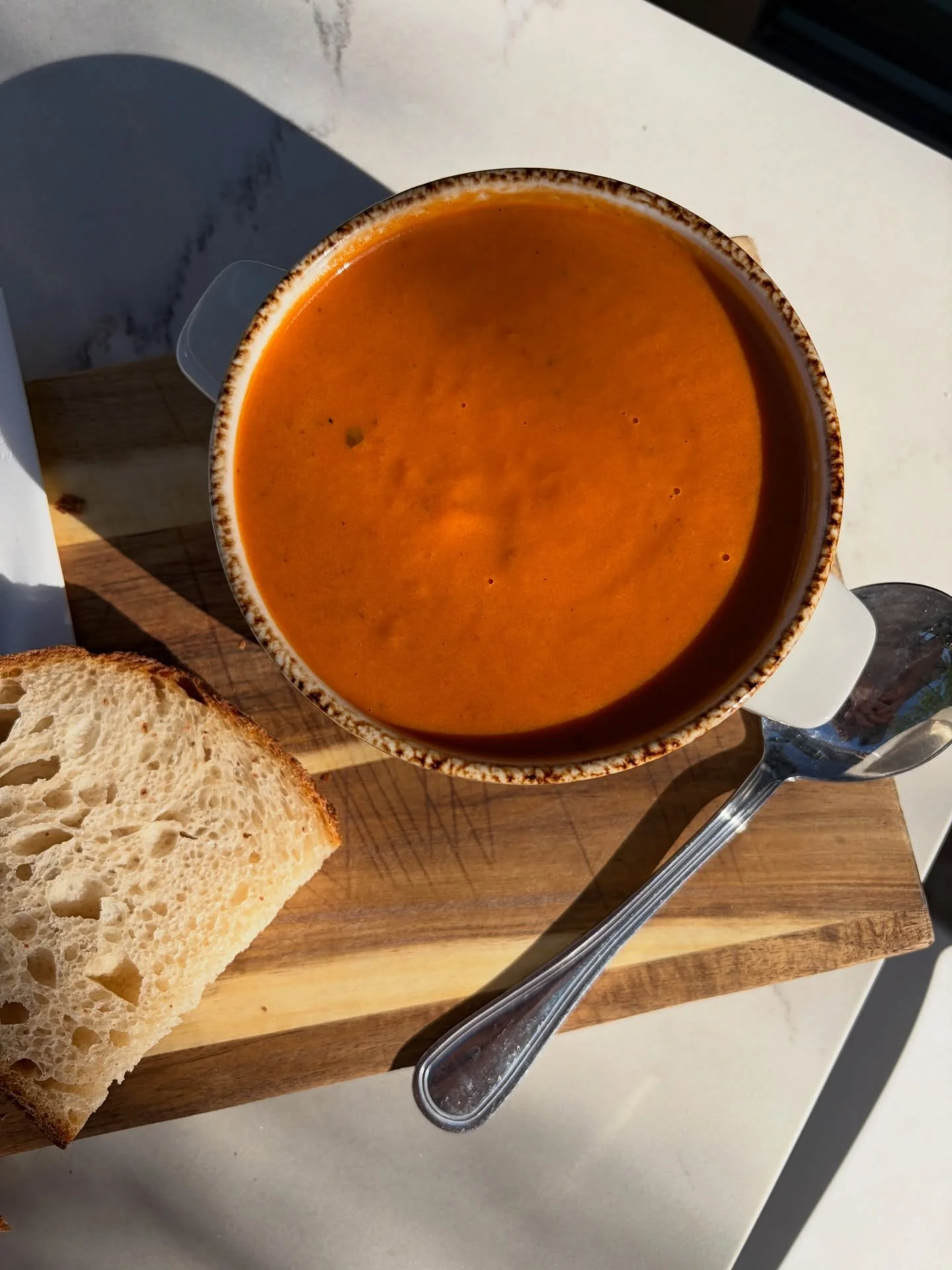 Hot soup in summer? Absolutely! Roasted San Marzano tomatoes, carrot, celery, basil, rosemary, thyme, a little heat from red chili flake, finished with pecorino and fresh cream. 

Some things still hit just right year round.