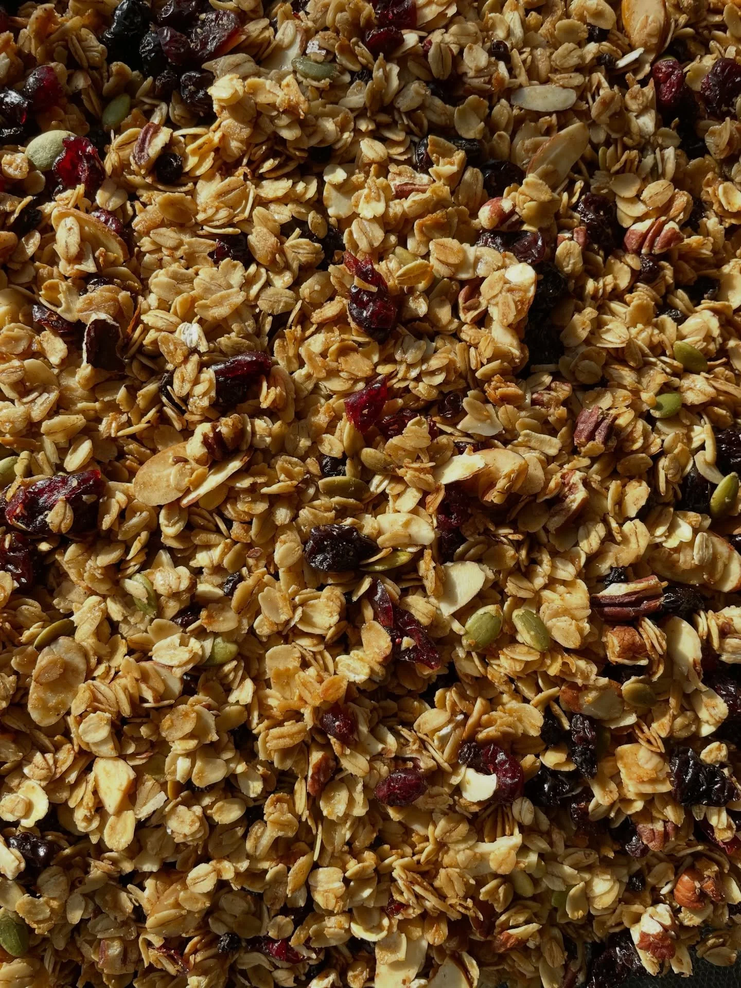 Our housemade granola starts the same way many of our favorite things do: by hand, in smaller batches, with thoughtfully chosen ingredients.

We toss together hearty oats, pecans, almonds, pumpkin seeds, flax, and coconut, then sweeten everything wit