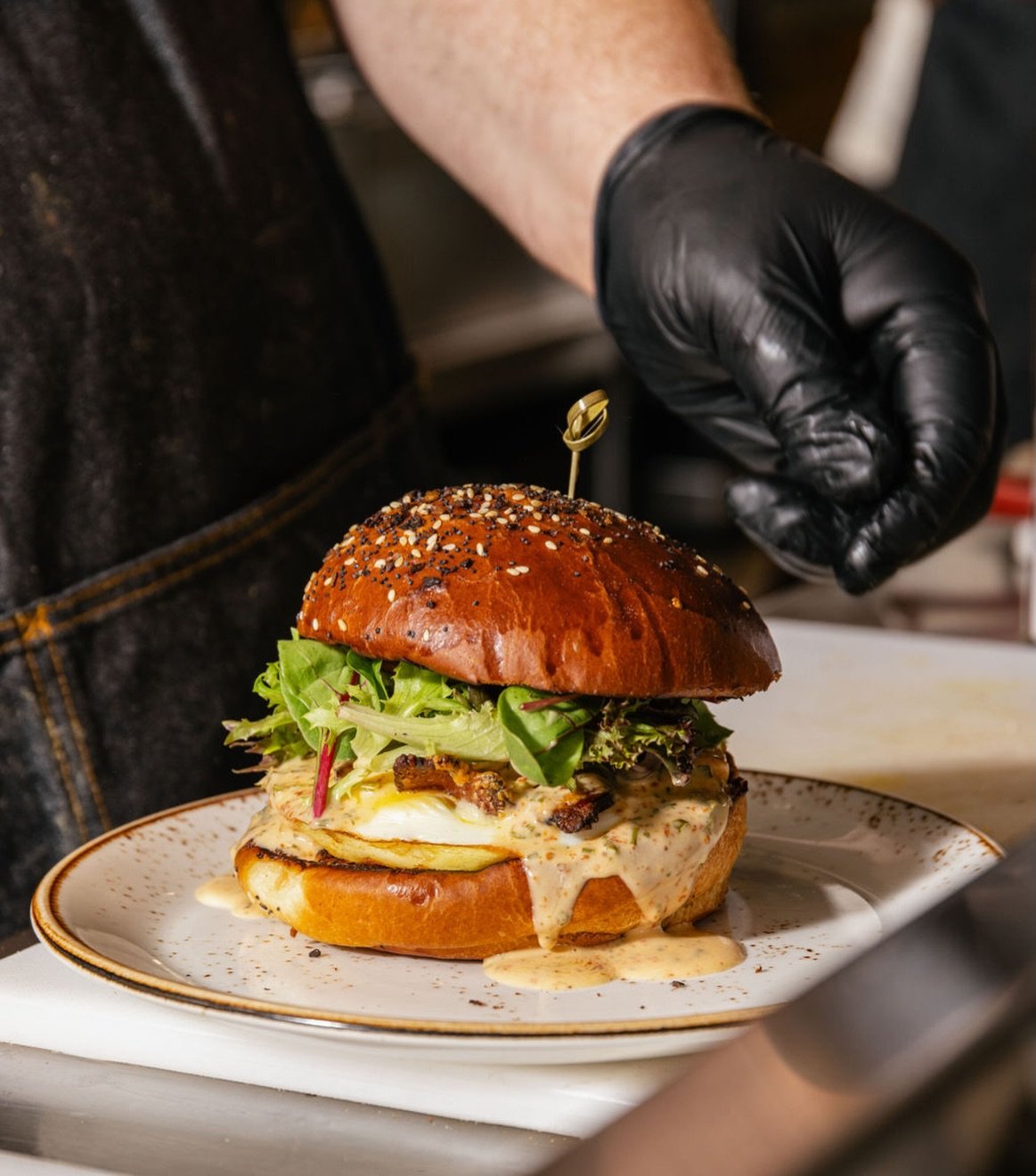 The bacon egg and cheese you know, with a little extra heat 💥

Crispy bacon, a fried local egg, melted cheddar, and spicy harissa aioli, finished with baby greens on everything brioche. 

Available in Malvern and Bryn Mawr.