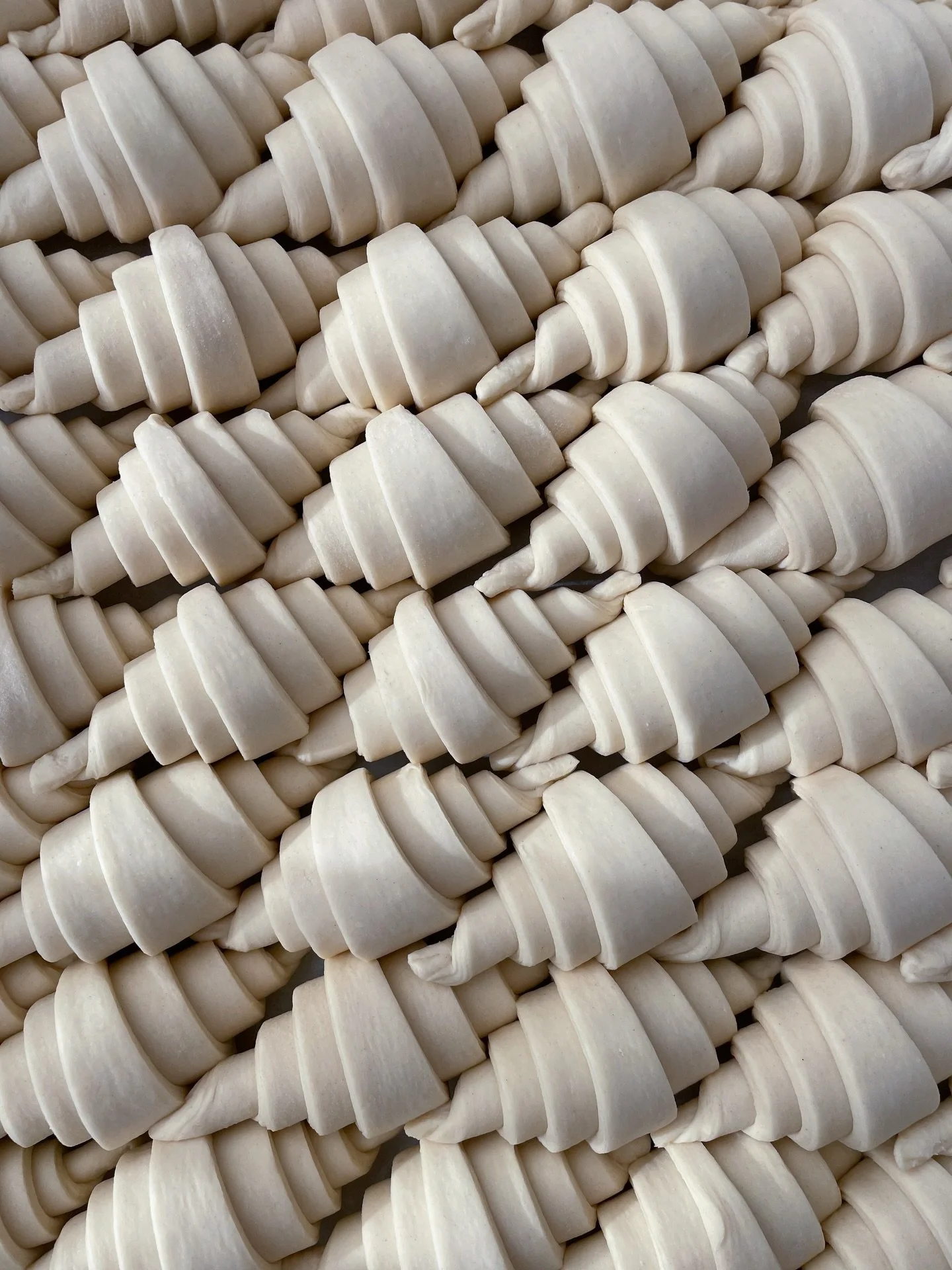Each Buttery croissant starts the same way. We lock butter inside the dough, then give it a single fold and a book fold, building 25 delicate layers of deliciousness.

We then repeat the process about 500 times a day, because great croissants don&rsq