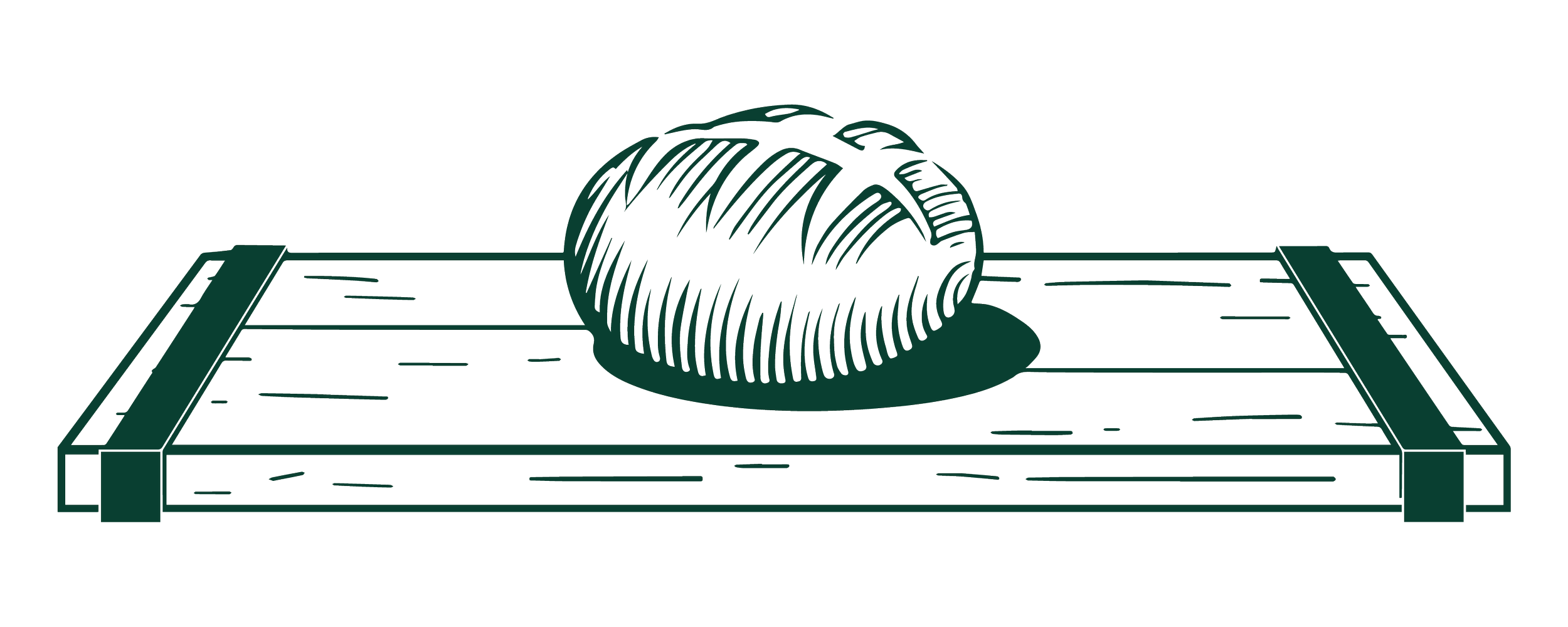 A bread loaf on a wooden cutting board