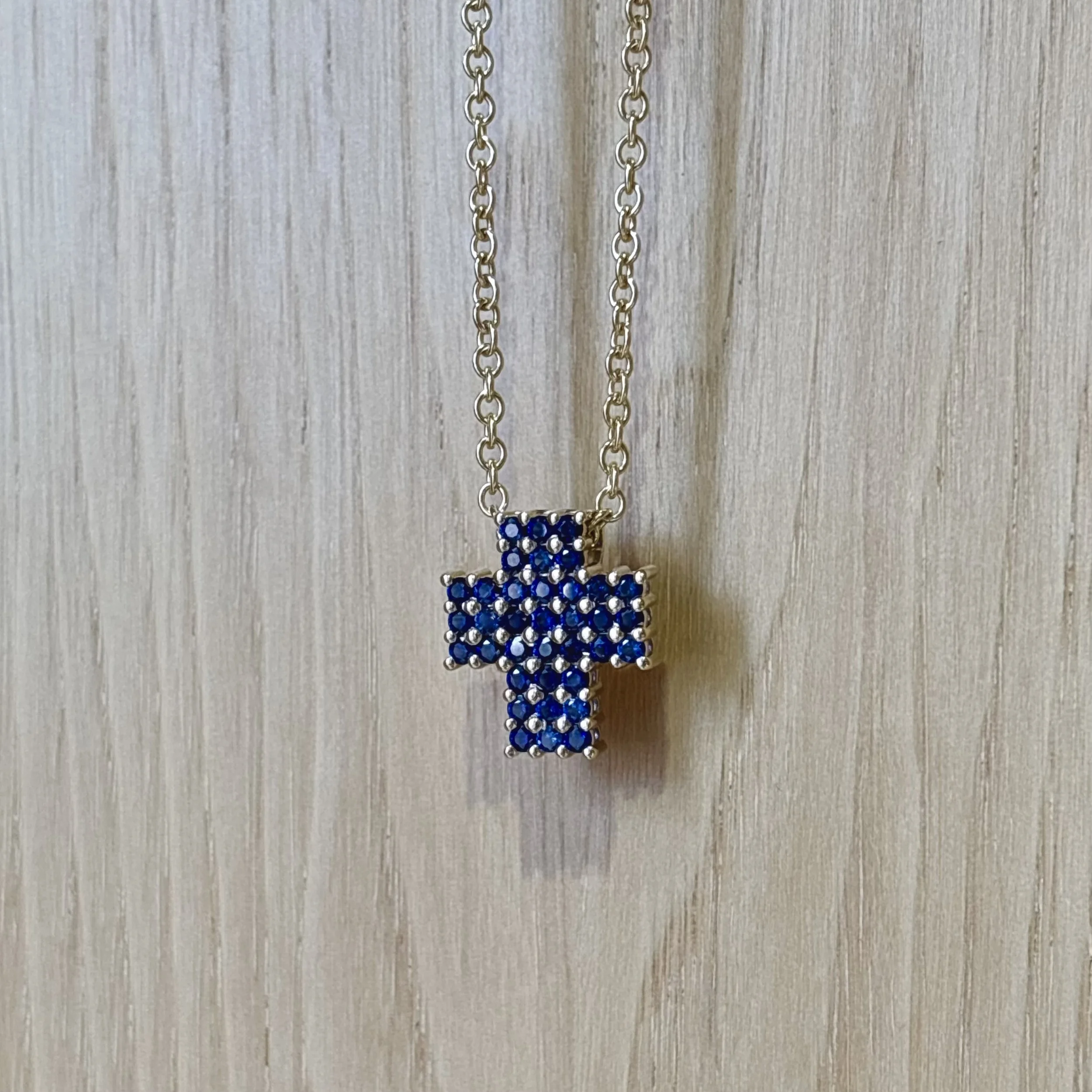 14k Yellow Gold 16’’ 2.25mm Cable Chain with 14k Yellow Gold Cross Pendant with 1.44 carat of Lab Grown Blue Sapphire - $4685