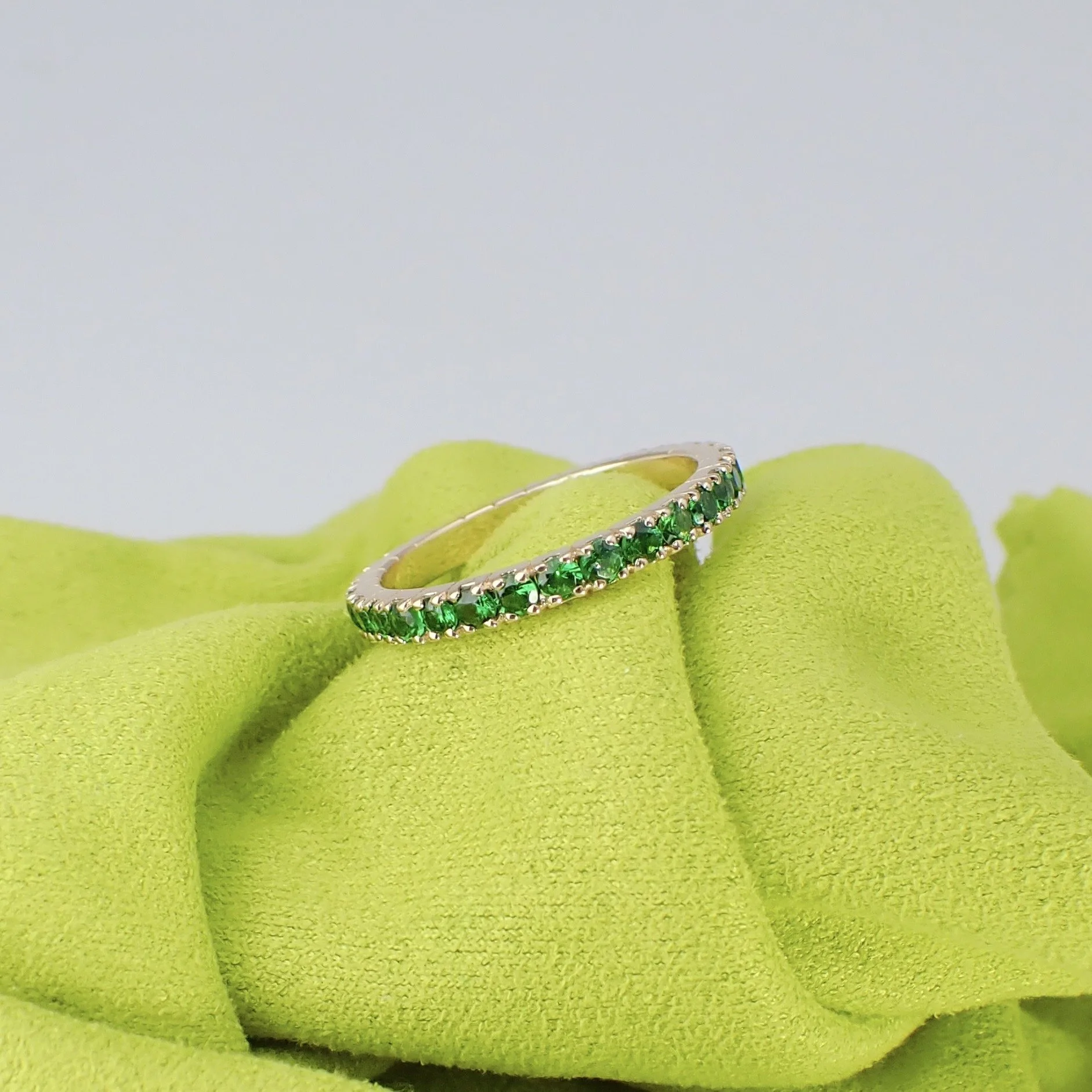 14k Yellow Gold Eternity Band with 1.59 carats of Green Tsavorite Garnet - $2445