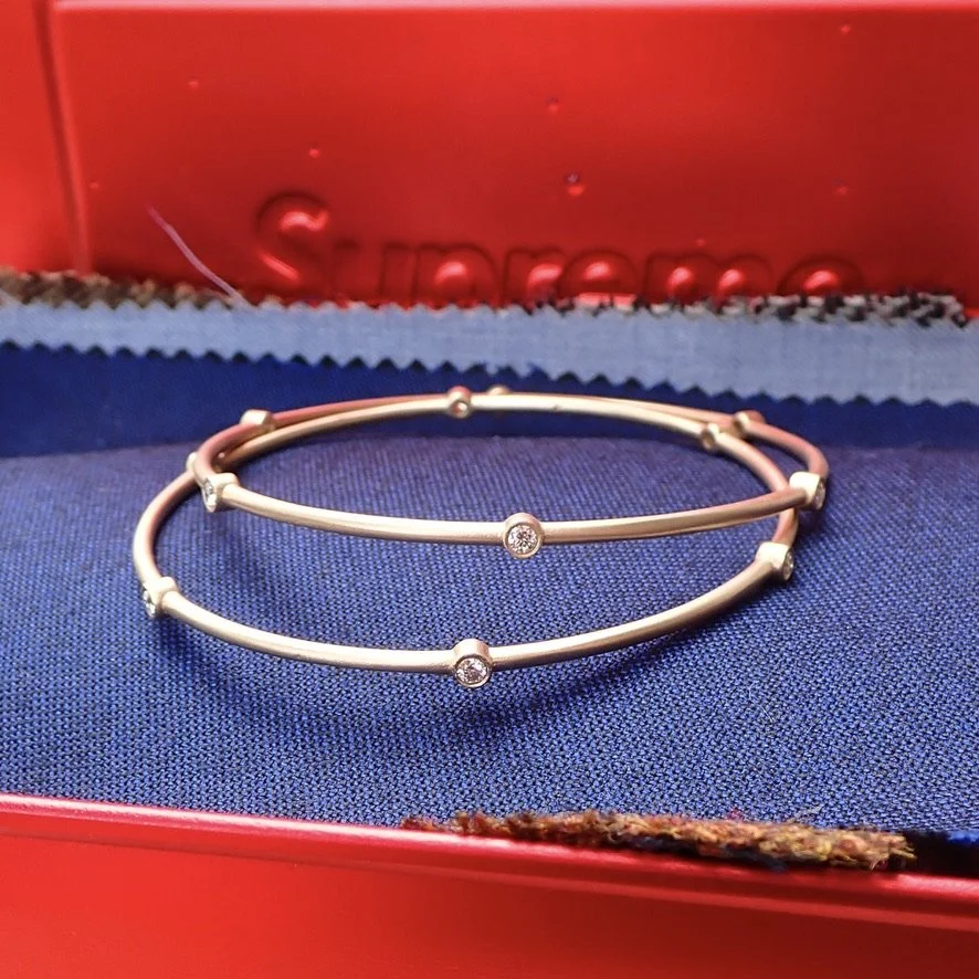 14k Yellow Gold Sandblasted Bangle with 0.33 carat of Bezel Set Diamond - $3340 each