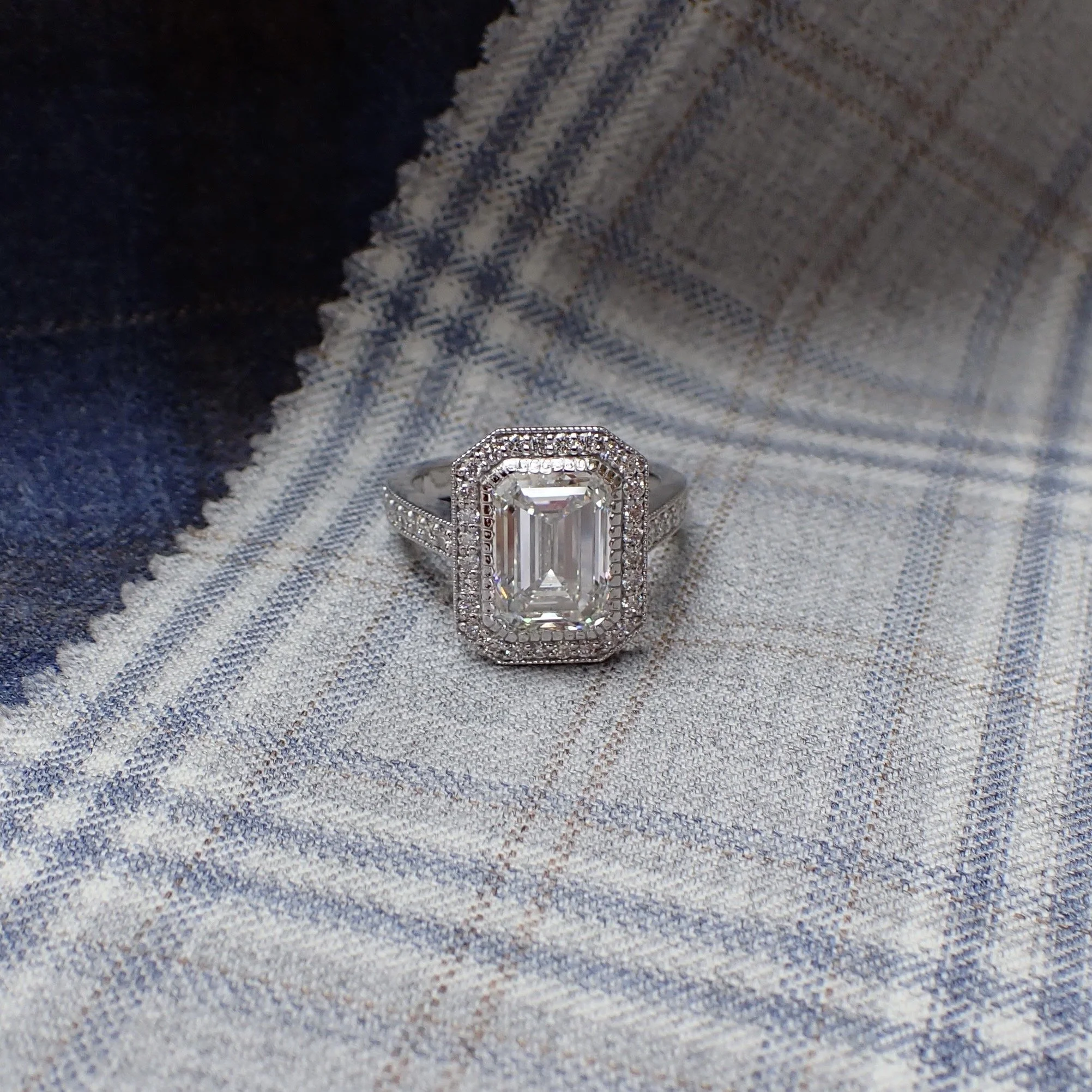 18k White Gold Engagement Ring with Milgrain Edge and a 3.56 carat Lab Grown Emerald Cut Diamond and 0.41 carats of Lab Grown Diamond - Size 6.5 - $5115  (3.56 carat Emerald Cut Lab Grown Diamond with Clarity Grade VVS2 and Color Grade F With IGI Rep