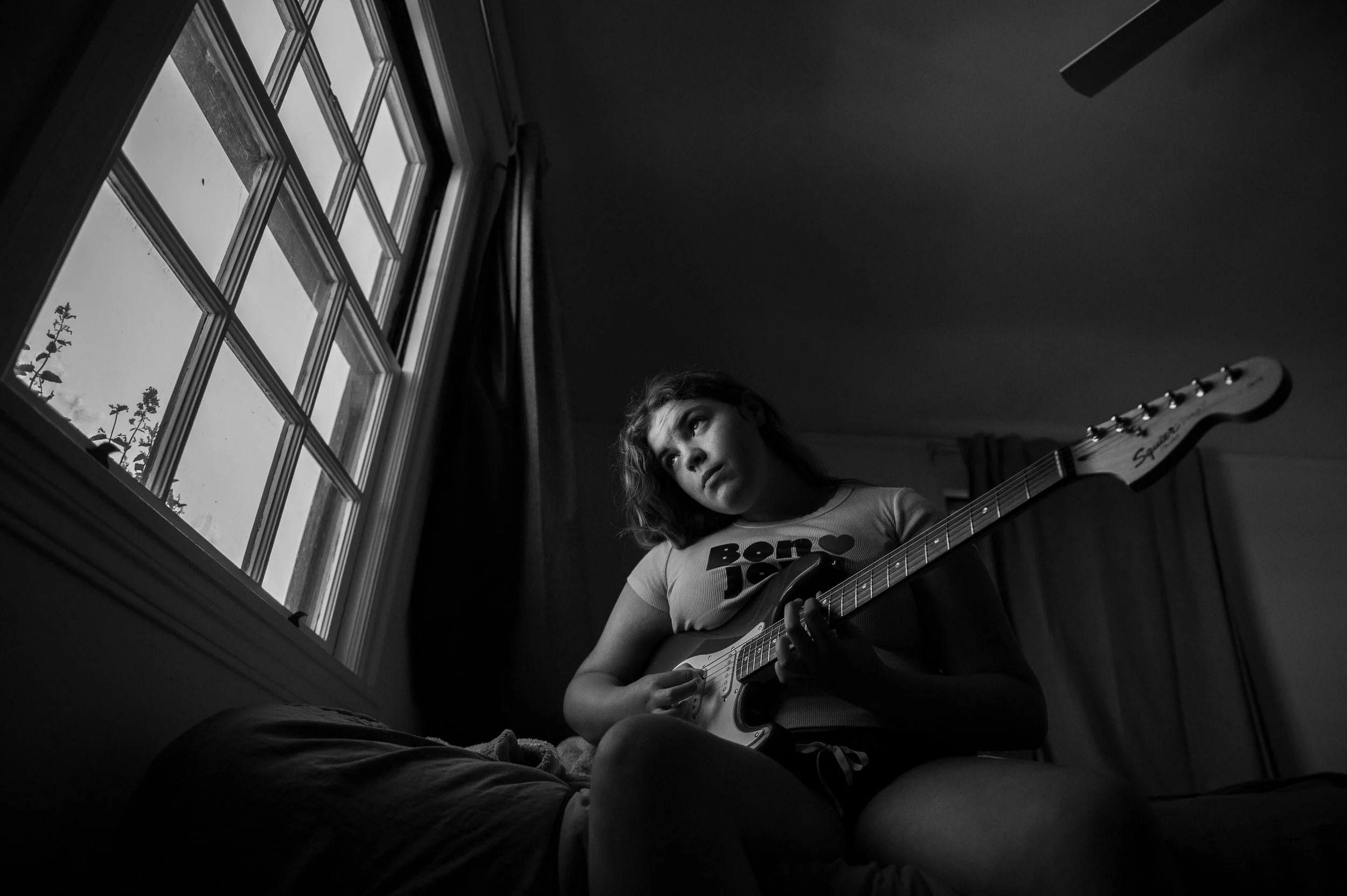 Sister Strumming The Guitar