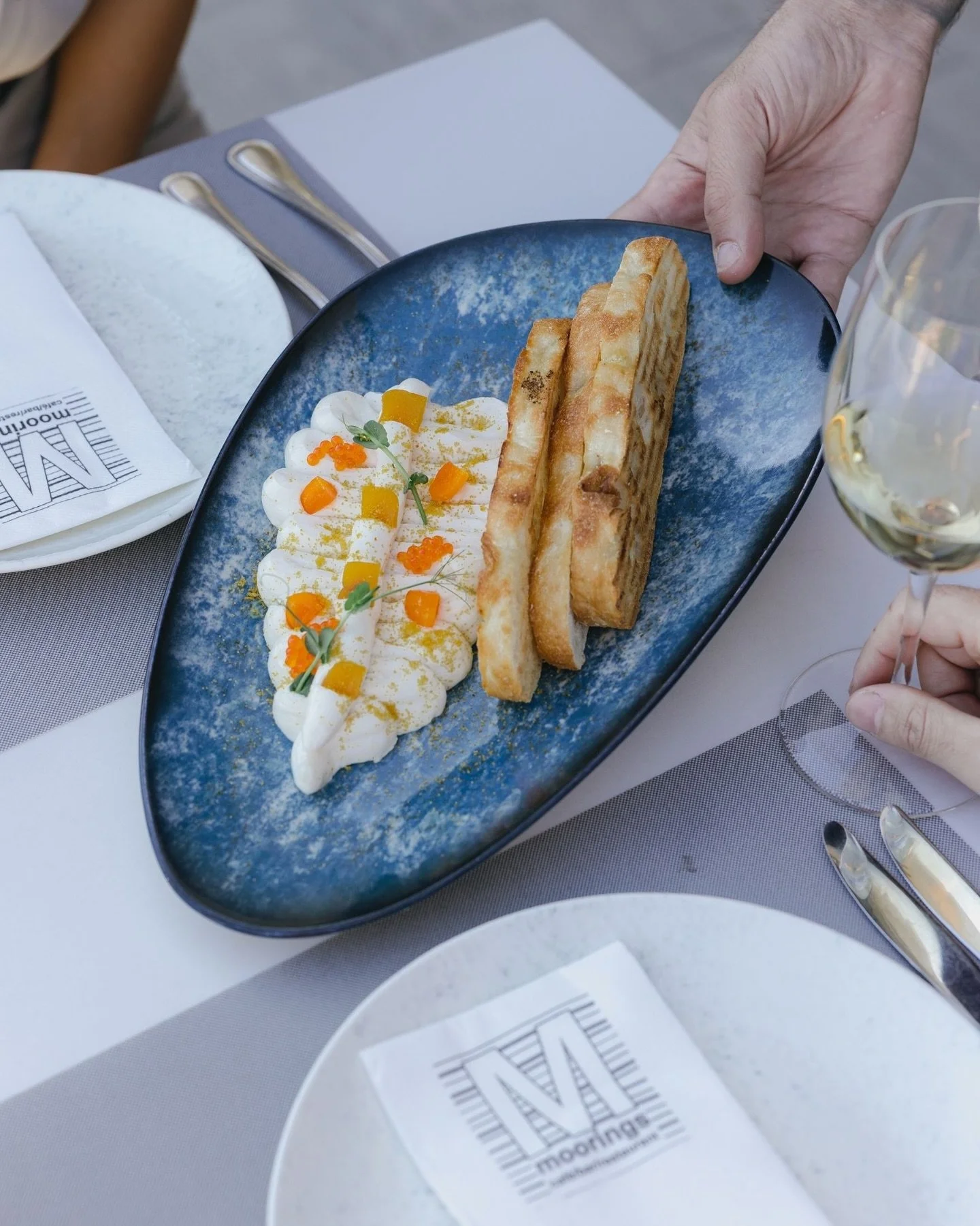 From the Mediterranean to your table 🇬🇷
Our Taramosalata, silky, rich, and perfectly balanced, served with golden toasted bread and bright citrus accents.

#mooringsmoments