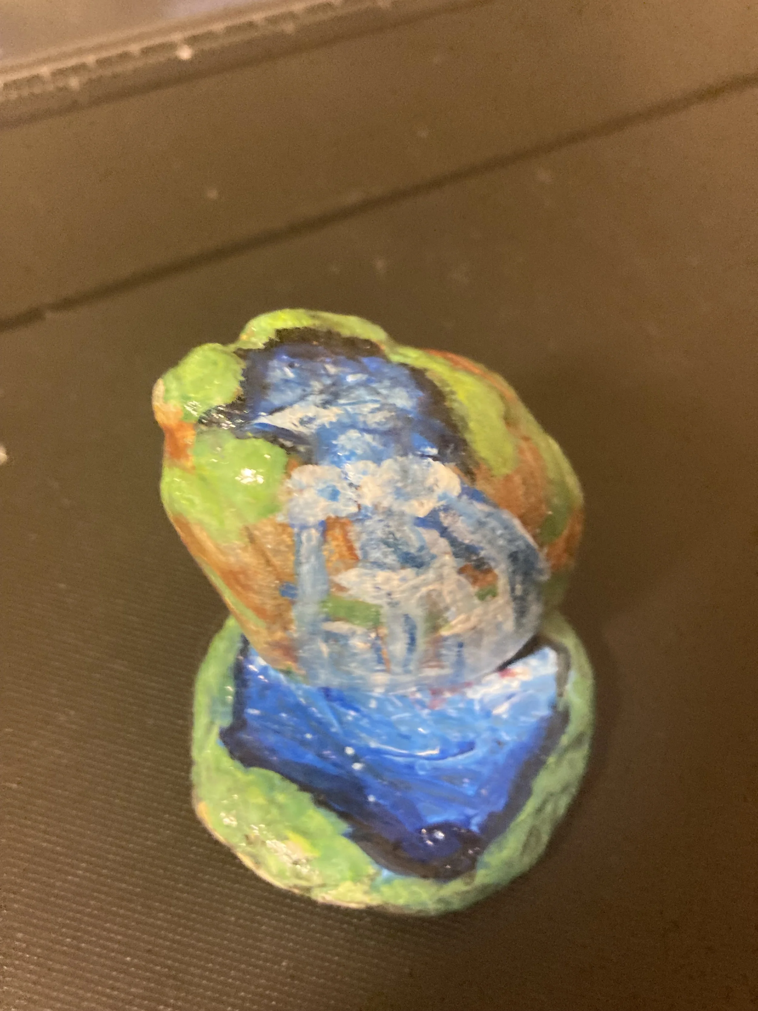 Lake and waterfall on 2 rocks