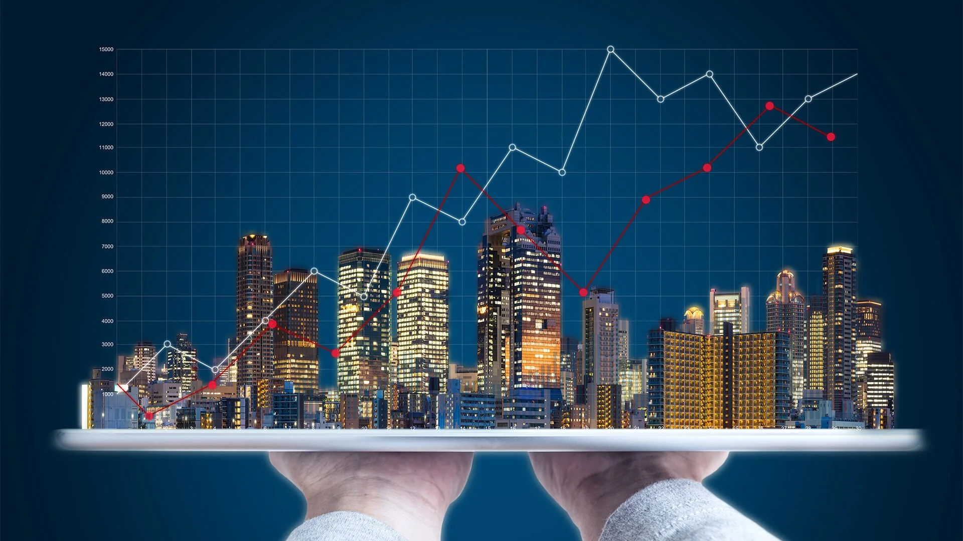A city skyline at night with illuminated skyscrapers, overlaid with a line graph showing trend data with white and red lines and points.