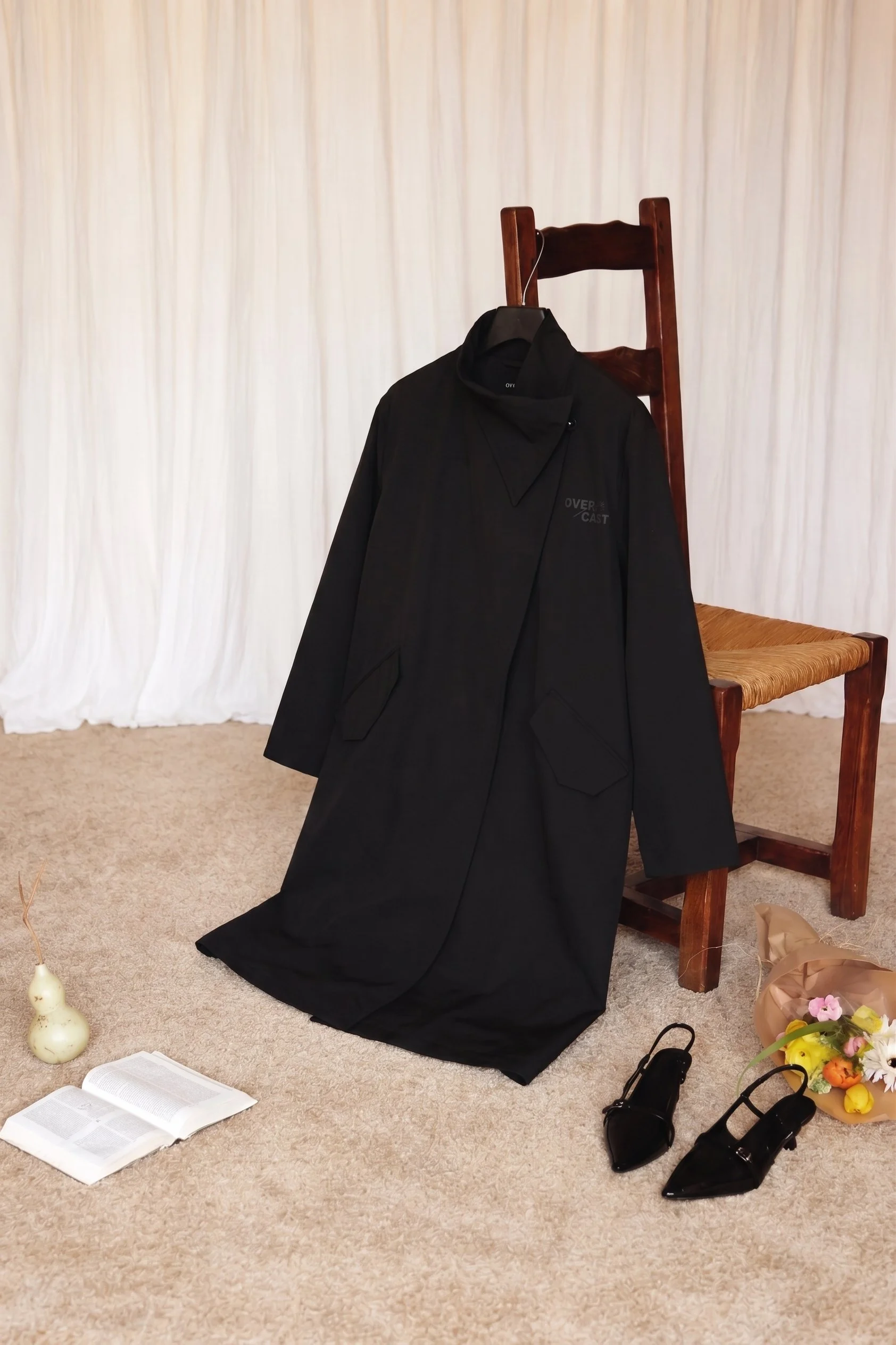 “A Rainy Day” — Black Wrap Raincoat