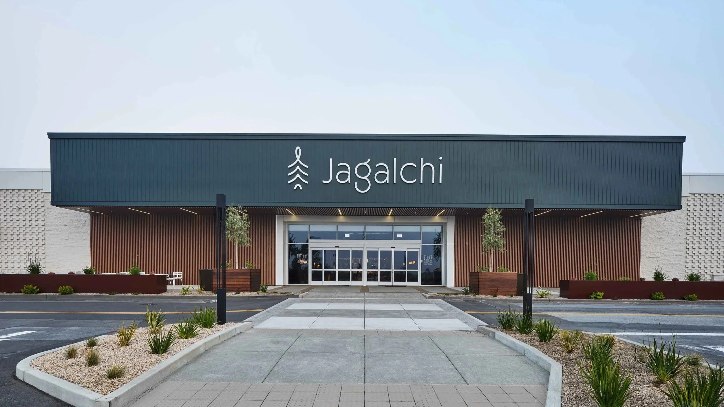 PARADIGM Structural Engineers Jagalchi building exterior facade showing modern architectural design, main entrance, and landscaping.