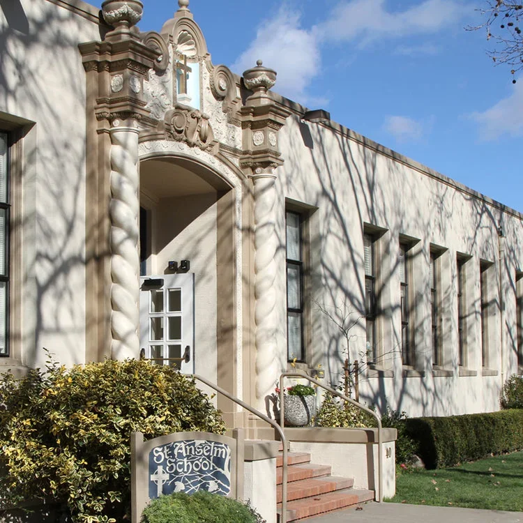 Exterior facade and entrance of St. Anselm School in San Anselmo, CA, showcasing classic architectural details and structural engineering by PARADIGM.