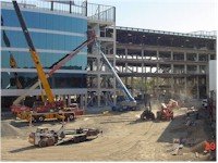PARADIGM Structural Engineers Marvell construction site showing heavy machinery and building framing work during structural development.