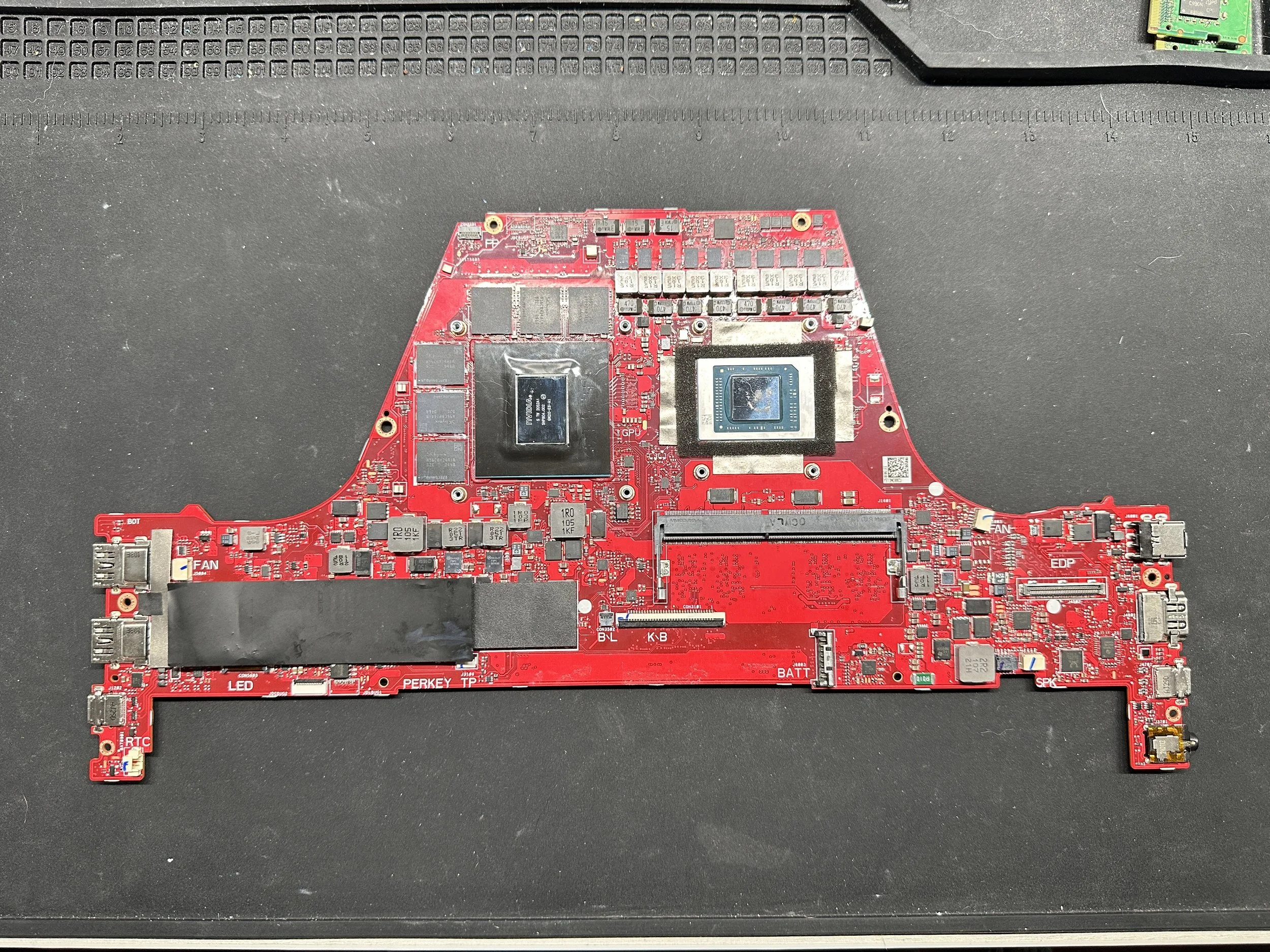 Cleaned and repaired Asus ROG Zephyrus G14 GA401Q motherboard after liquid metal damage and power rail restoration