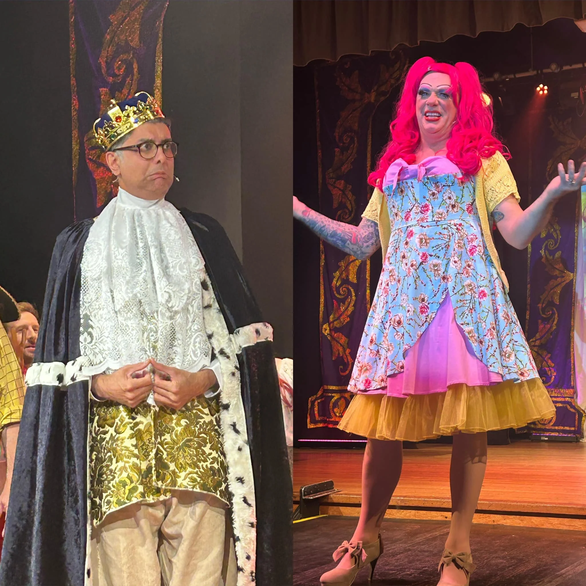 A man dressed as a king with a crown and regal robes stands on the left, looking serious. A woman dressed as a colorful, exaggerated character with bright pink hair, a floral dress, and high heels stands on the right, speaking or performing on stage.