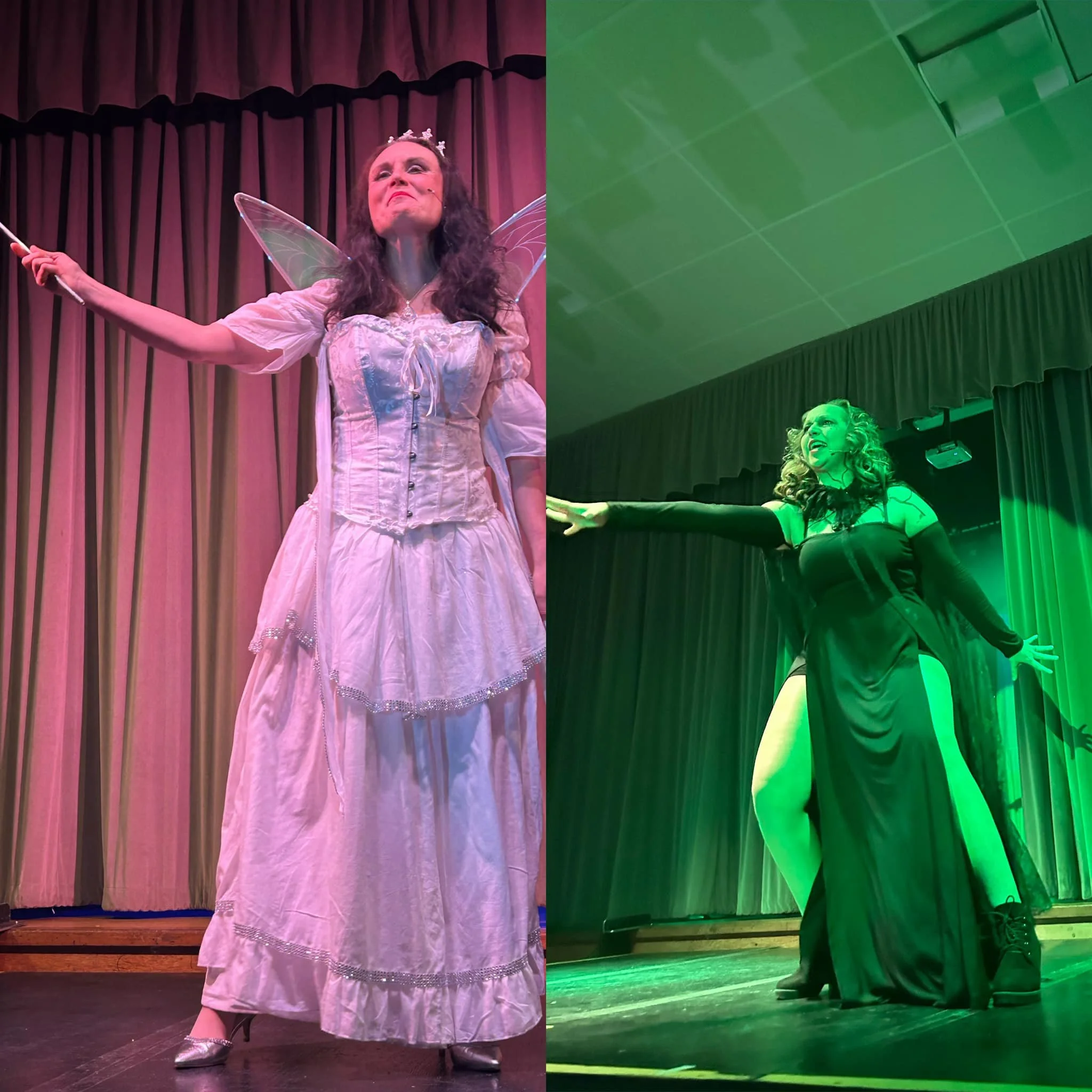 Two women dressed as fairies with wands performing on stage. The woman on the left wears a white dress and fairy wings, standing with her arm extended upward. The woman on the right wears a black dress with a slit, black gloves, and poses with arms o