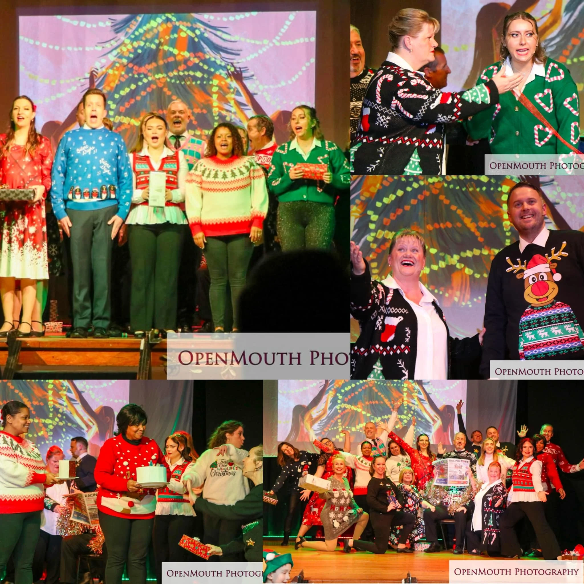 Group of people celebrating Christmas on stage, wearing holiday sweaters, Santa hats, and festive attire, with colorful holiday-themed backdrop.