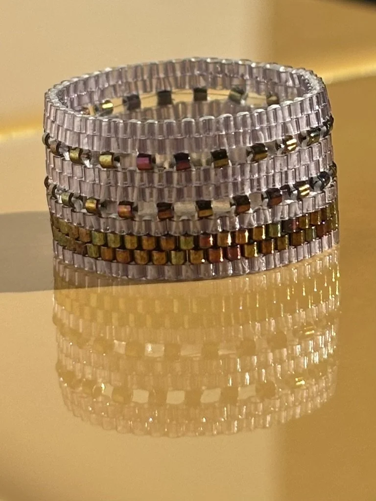 Forward view of the Lavender bronze iris double latticed ring