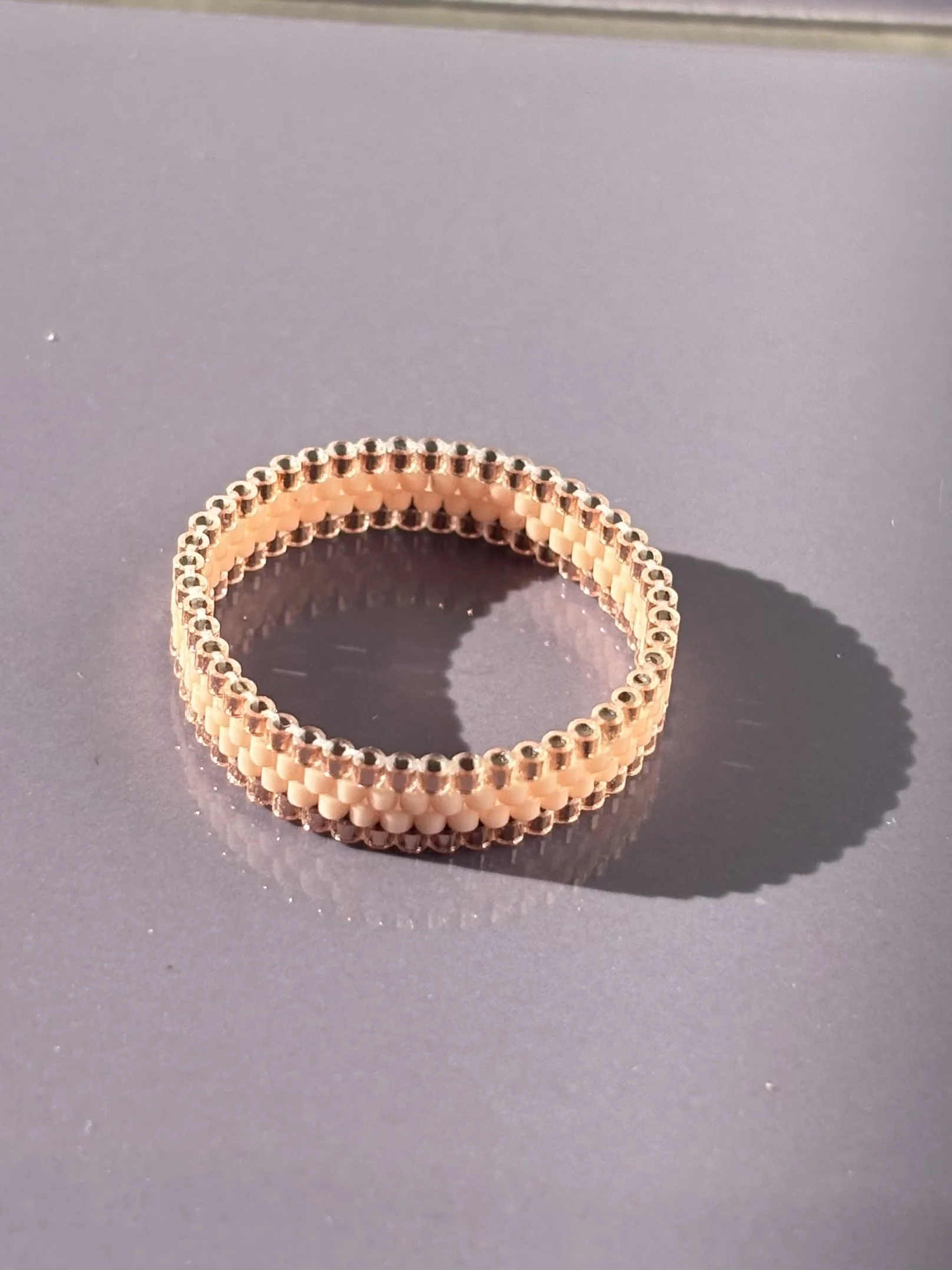 Front view of the Metallic Rose baby pink stackable ring