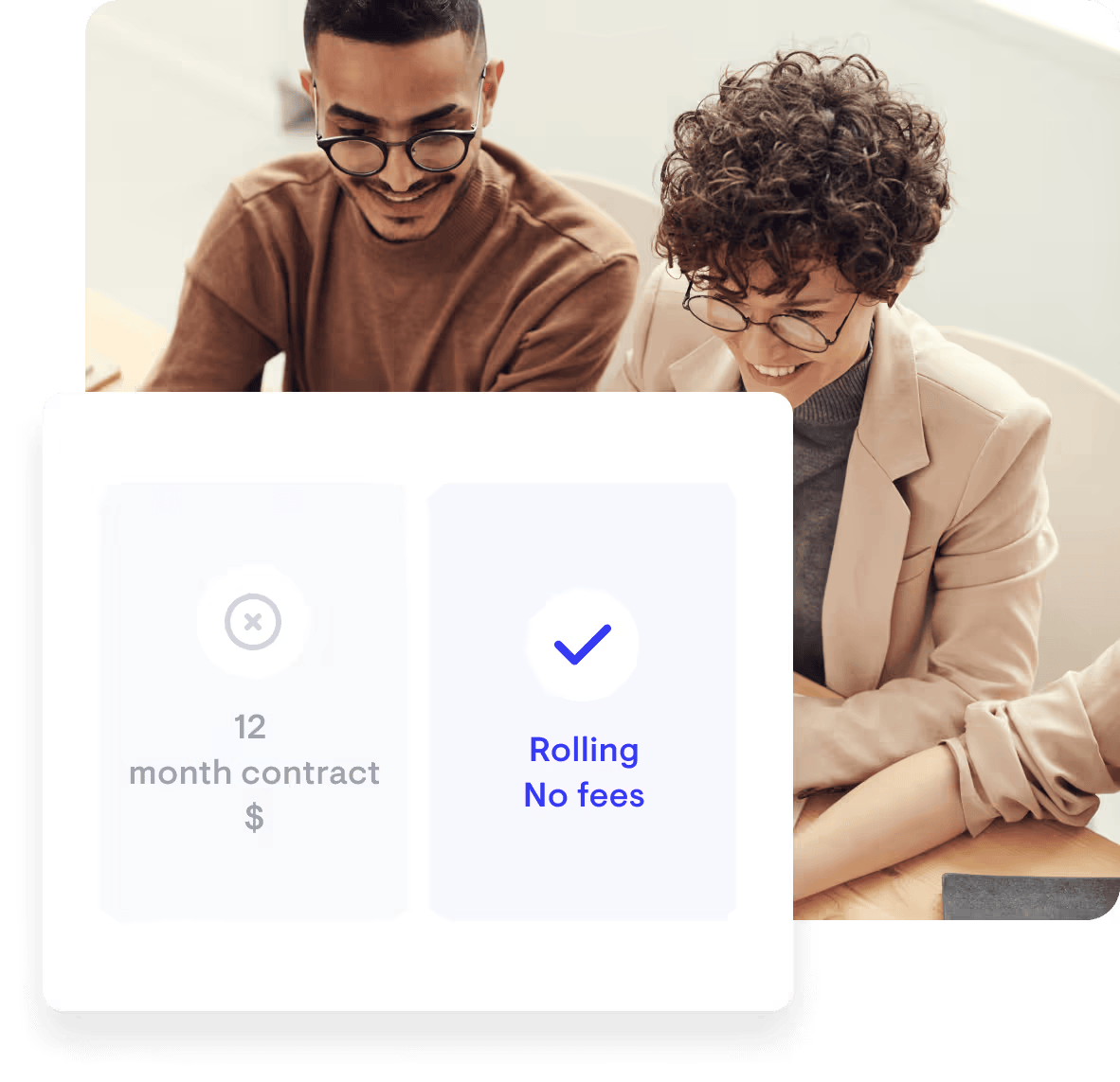 Two people smiling and looking at a digital screen showing a 12-month contract with no fees and a checkmark icon.