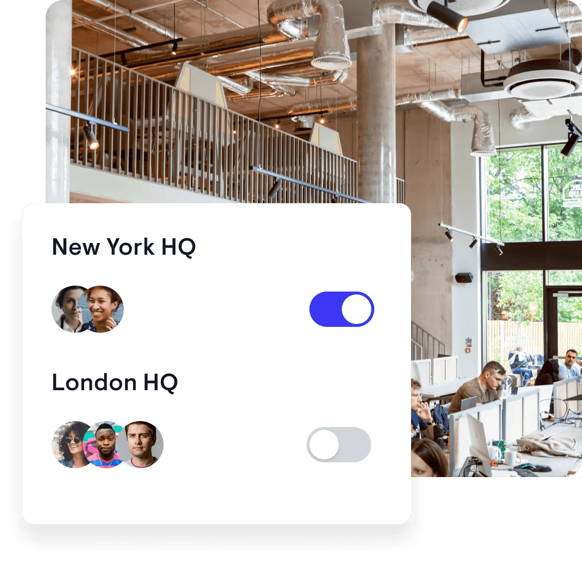 Modern open-plan office with high ceiling, exposed ductwork, large windows, and people working at desks.