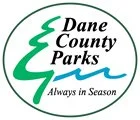 Dane County Parks logo with a green tree outline and the slogan 'Always in Season'.