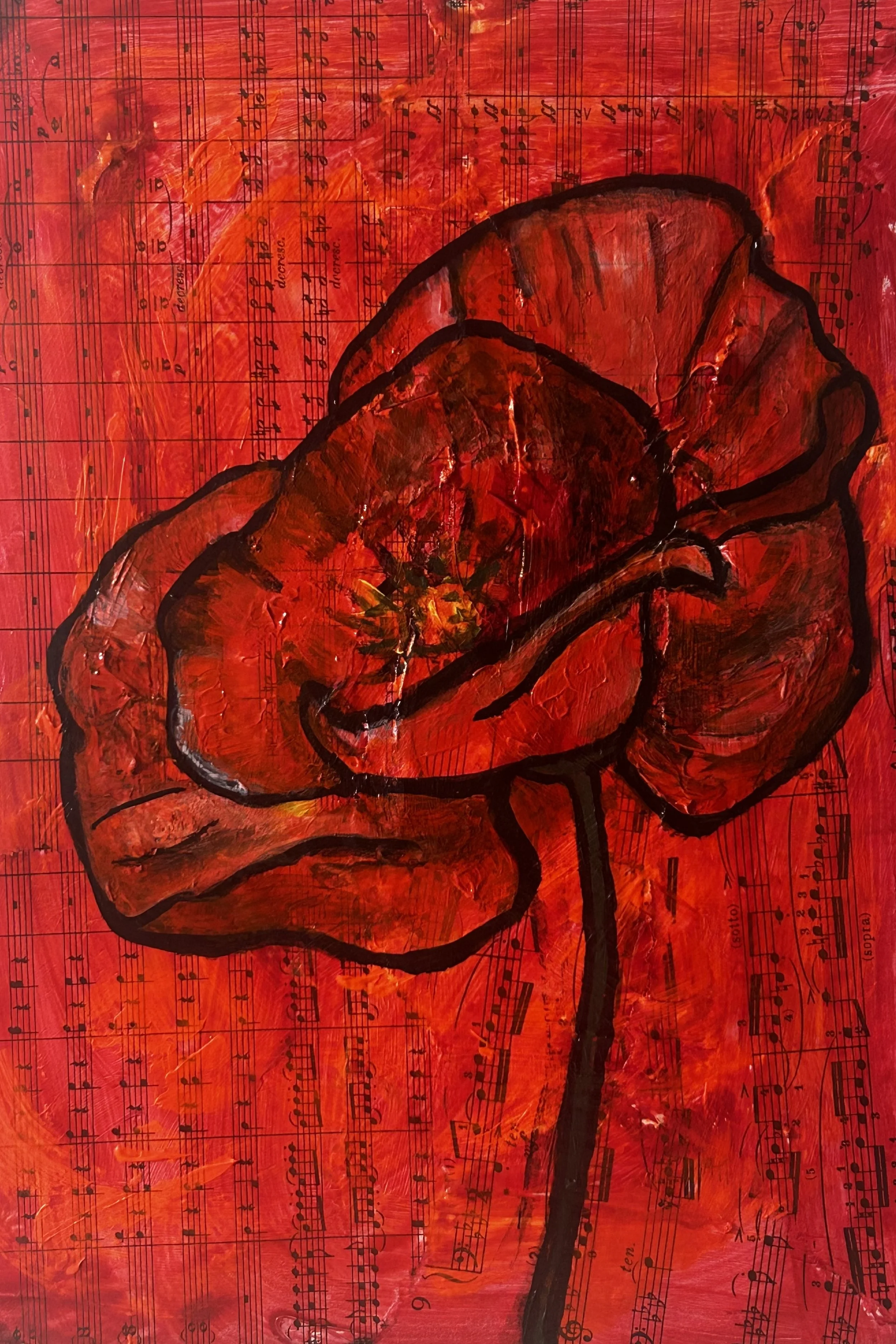 Poppy in red on music.jpg