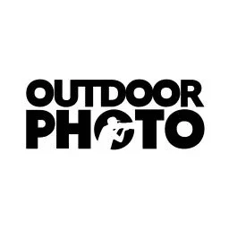 A logo with the words 'Outdoor Photo' in bold black letters and a camera icon incorporated into the text.