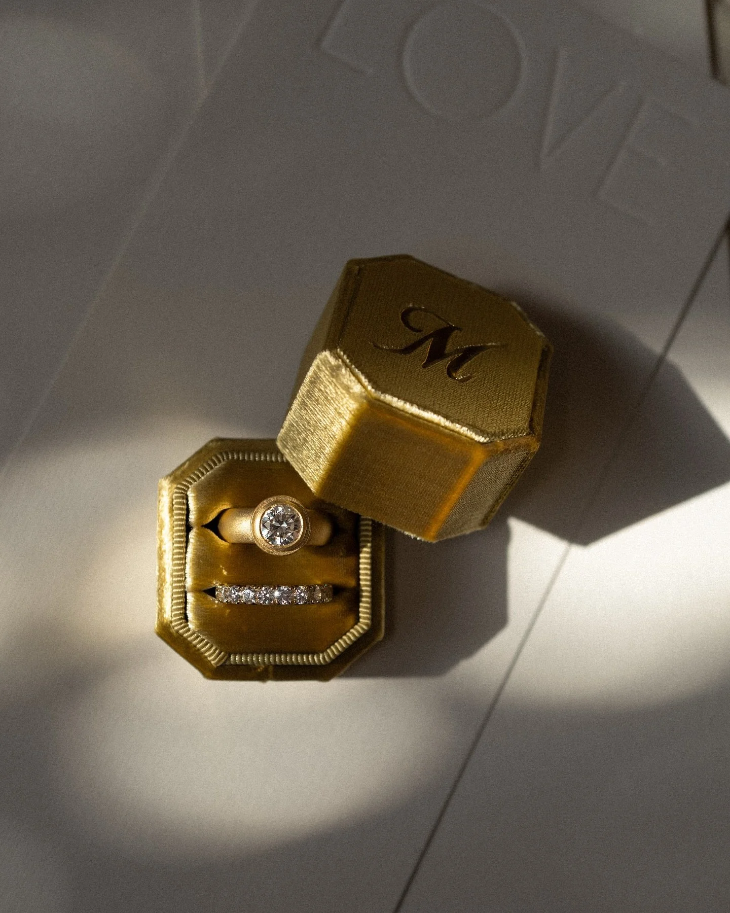 1.41 carat Round Cut Diamond set in 22k 
with an 18k Diamond Eternity Band