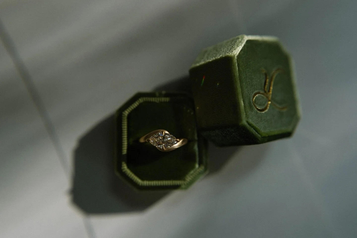 A custom 1.50 cts Faint Brown VVS1 Marquise Diamond set in 18k yellow gold.