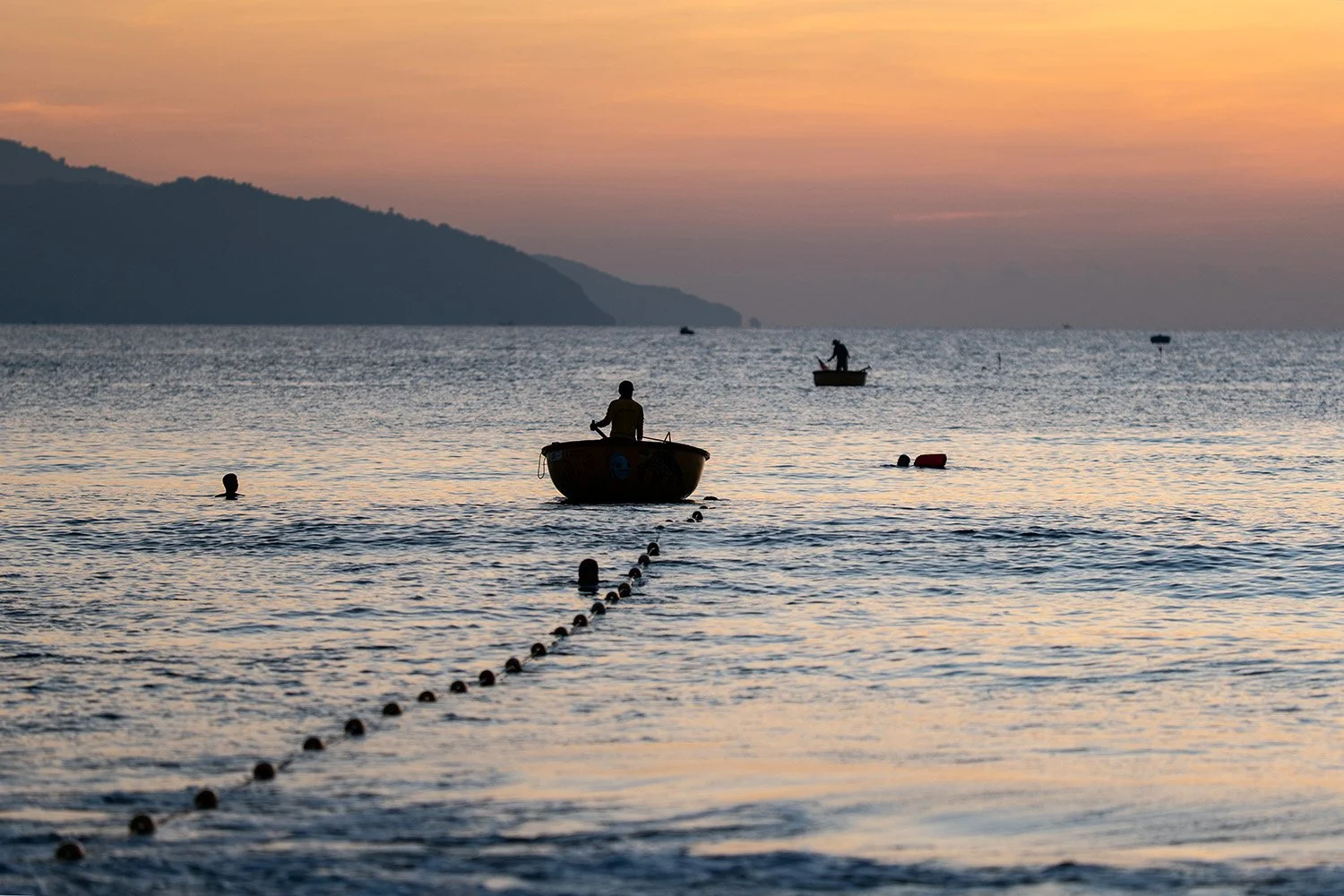 Da Nang Sunrise Round Boats.jpg