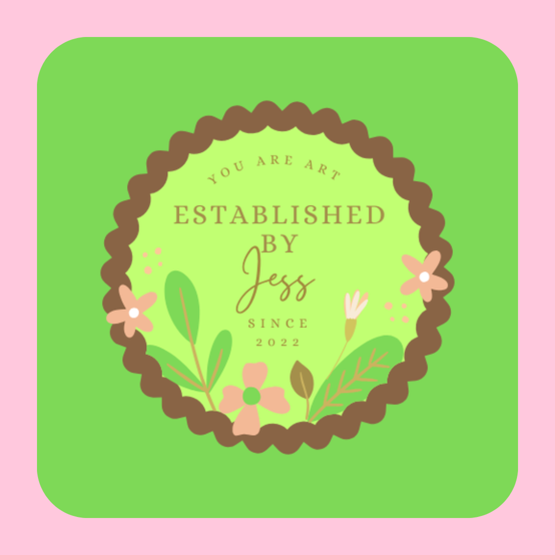 A decorative badge with a green background, framed with a brown scalloped border, featuring flowers and leaves, with the text "You Are Art, Established by Jess, Since 2022" in the center.