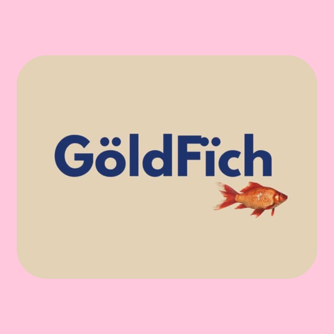 A beige rectangle with rounded corners containing the word 'GöldFich' in bold navy blue text and an image of a goldfish on the right side, set against a pink background.
