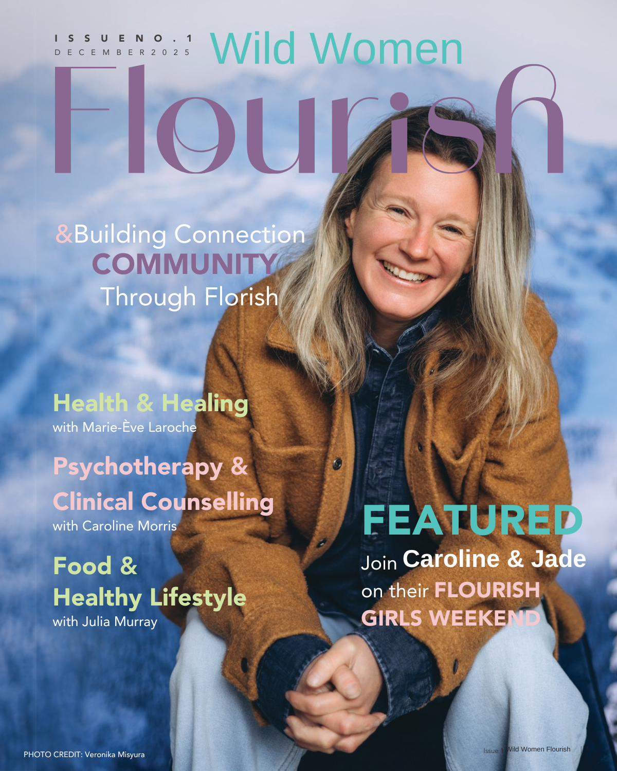 Cover of Wild Women Flourish magazine, December 2023 issue, featuring a smiling woman sitting outdoors with mountains in the background, wearing a brown jacket over a denim shirt.