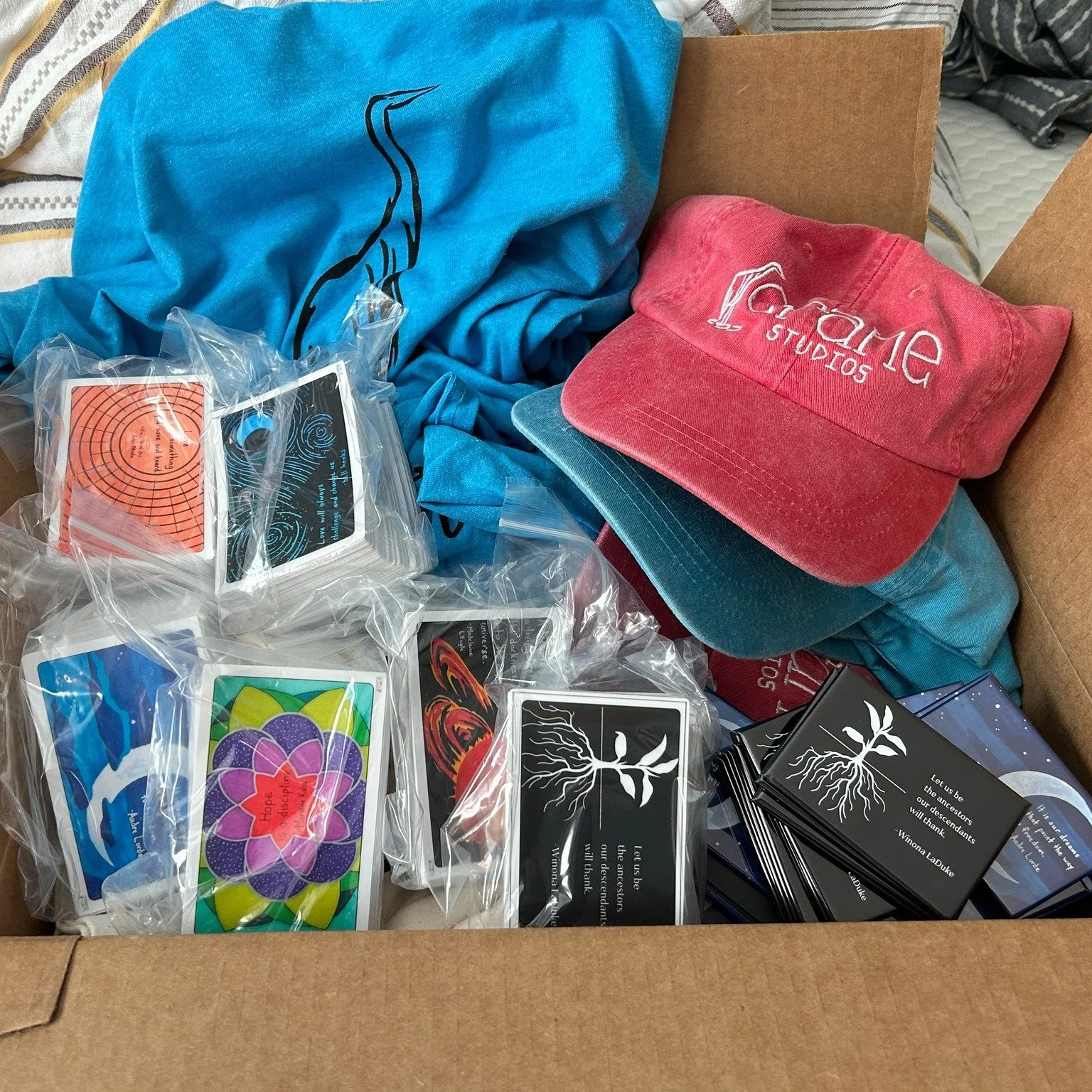 for those of you who ordered some Crane Studios items during my fundraiser last month, you'll be happy to know that I now have almost everything in hand and will be able to send orders out very soon! and while i only have the number of shirts and hat