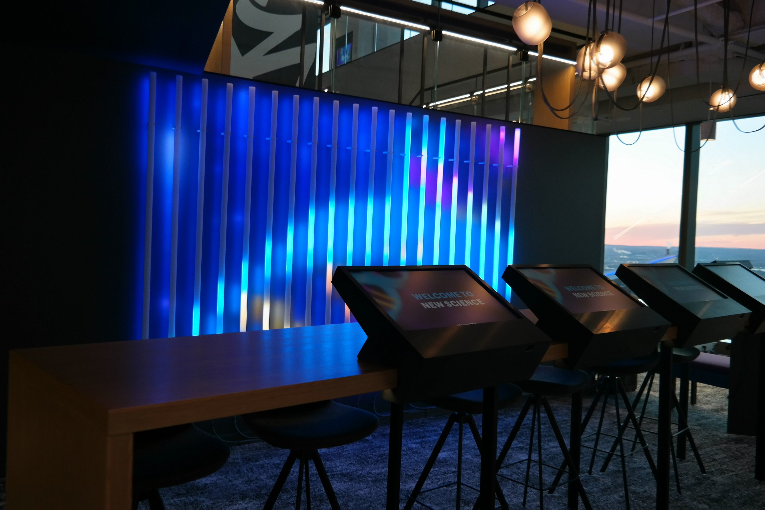 Light installation created with custom-reactive LED tubes and creative low-fidelity graphics.