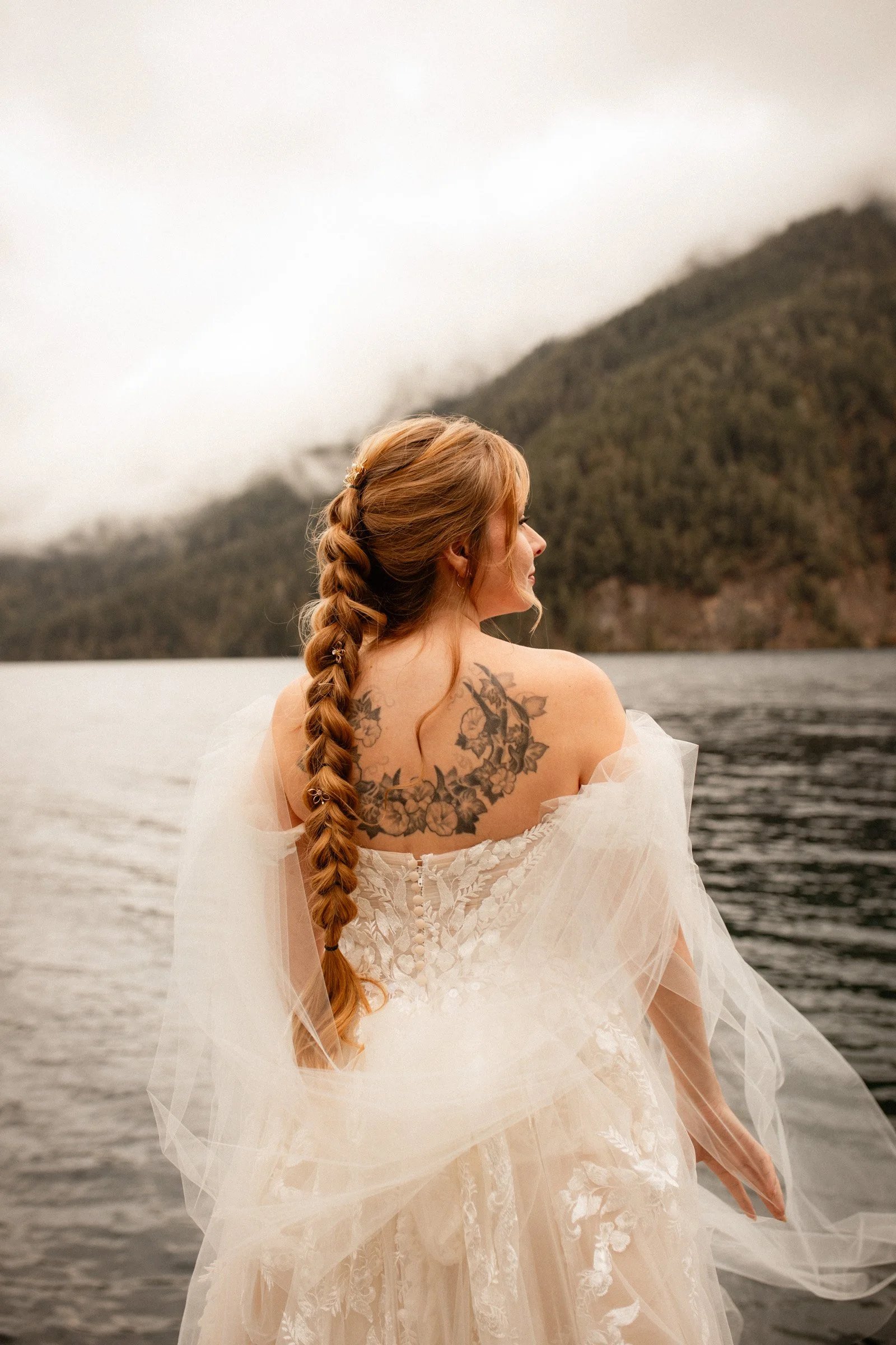 Bridal portrait on the dock at Lake Crescent, captured moments before the ceremony at Lake Crescent Lodge in Port Angeles, Washington.
