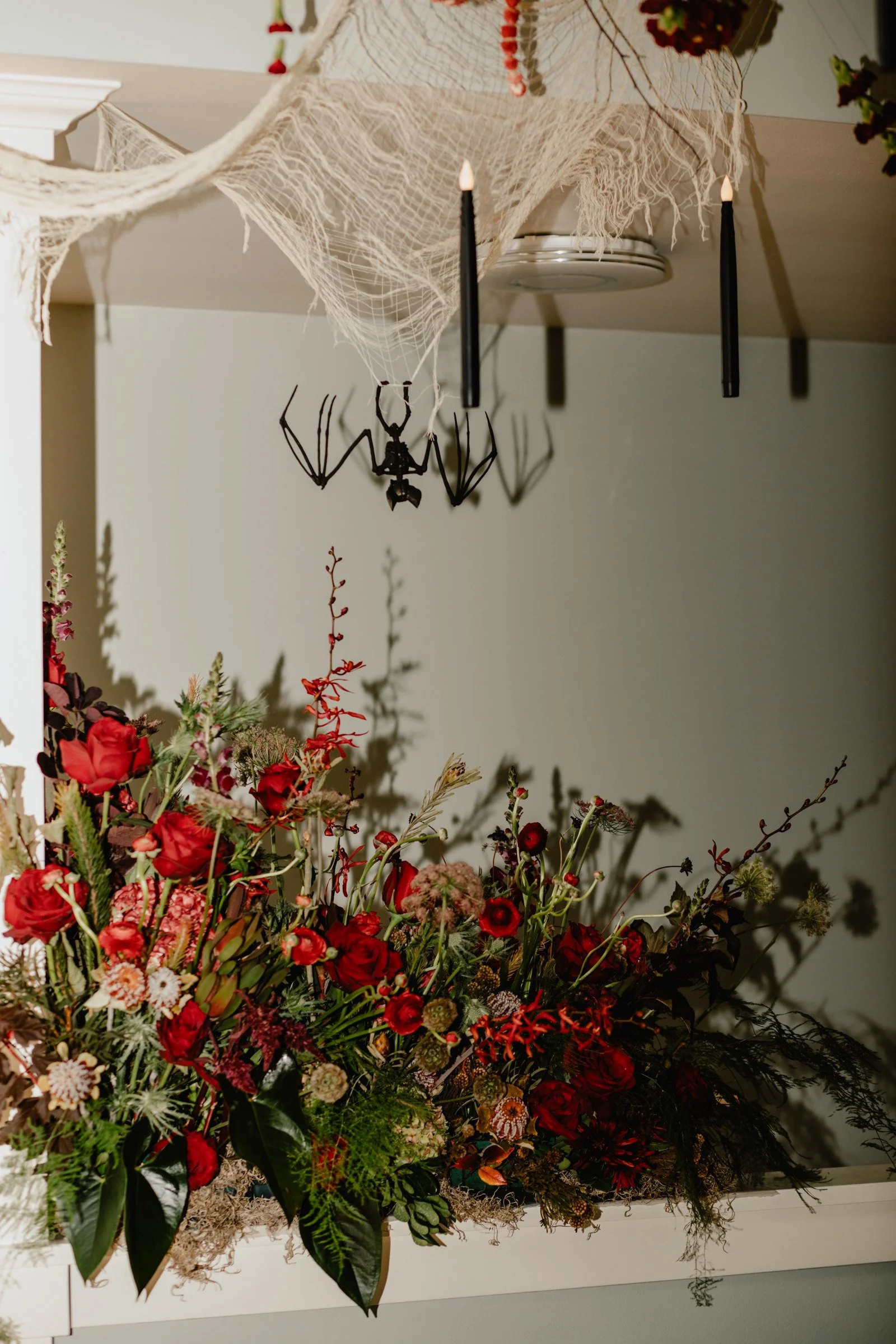 Spooky floral arrangements and halloween decor for this Halloween weekend wedding in Seattle