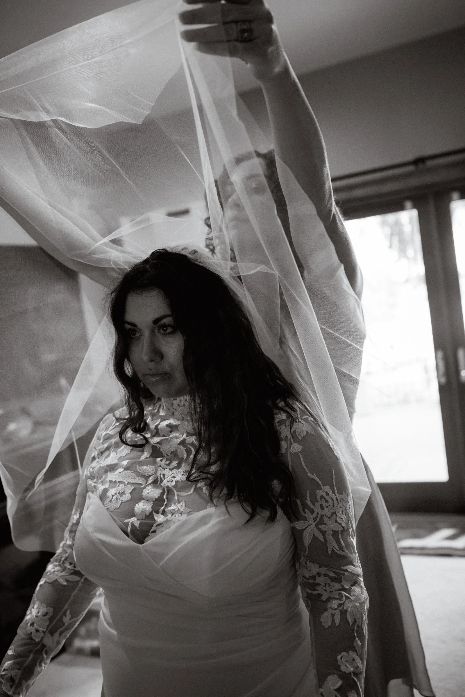 Bride putting on her wedding dress at a Spanaway, WA Airbnb