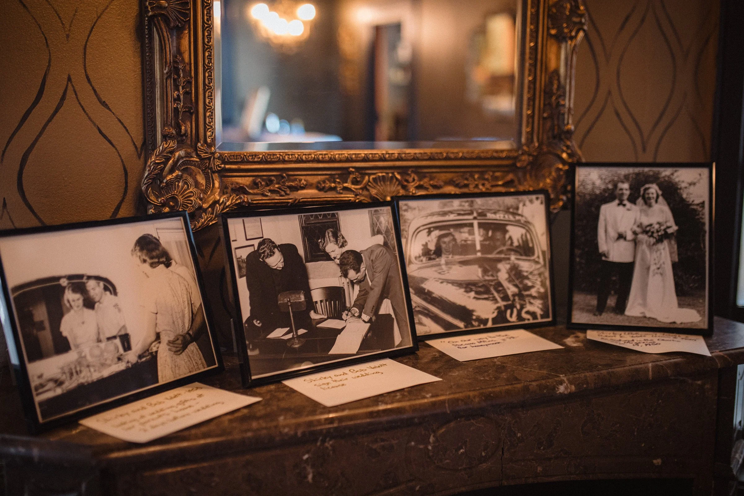 Framed wedding photos of the couple’s grandparents displayed as a meaningful wedding detail at The Ruins wedding venue in Queen Anne, Seattle