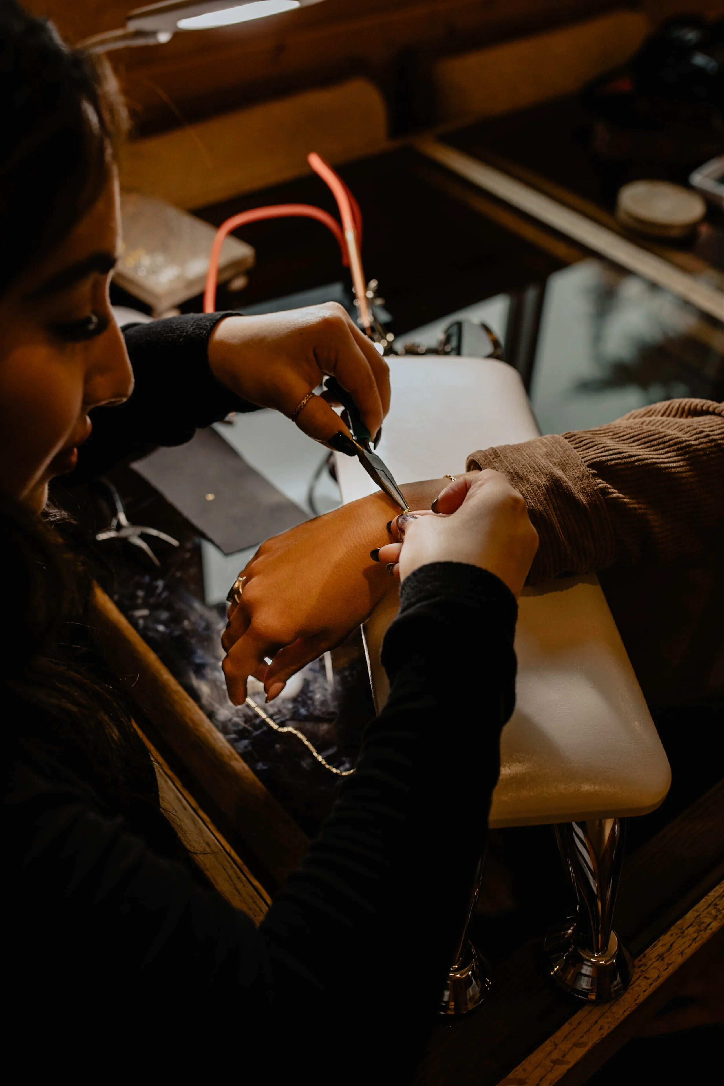 A person getting a manicure at a nail salon. Seattle professional head shot photography