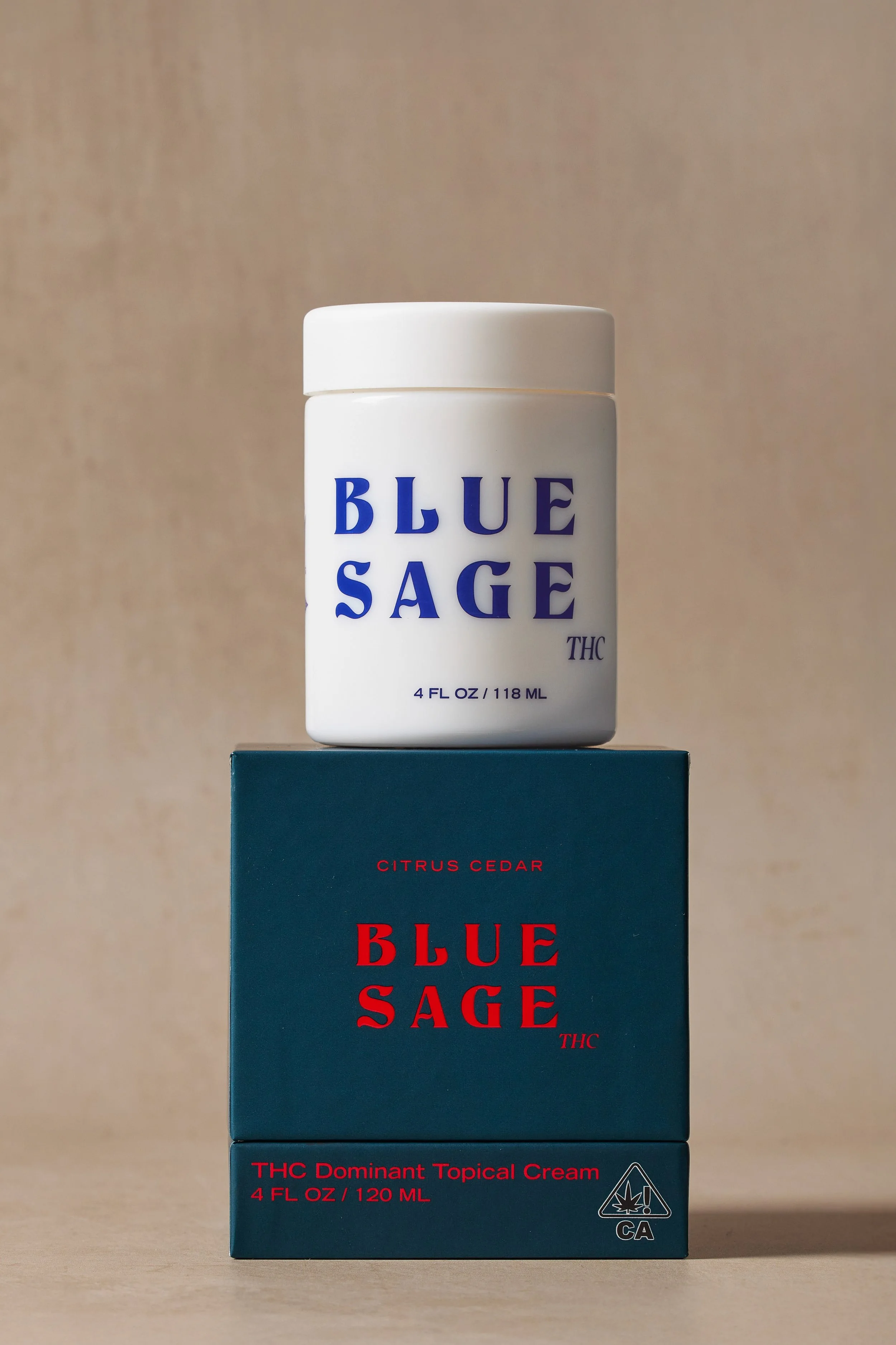 Picture of Blue Sage THC Cedar jar on top of blue box