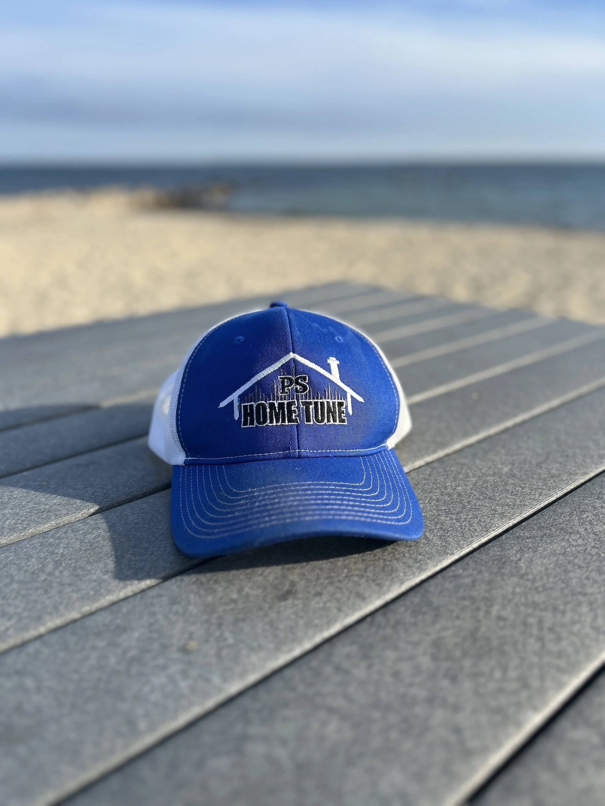 Blue hat that says PS Home Tune with a roof