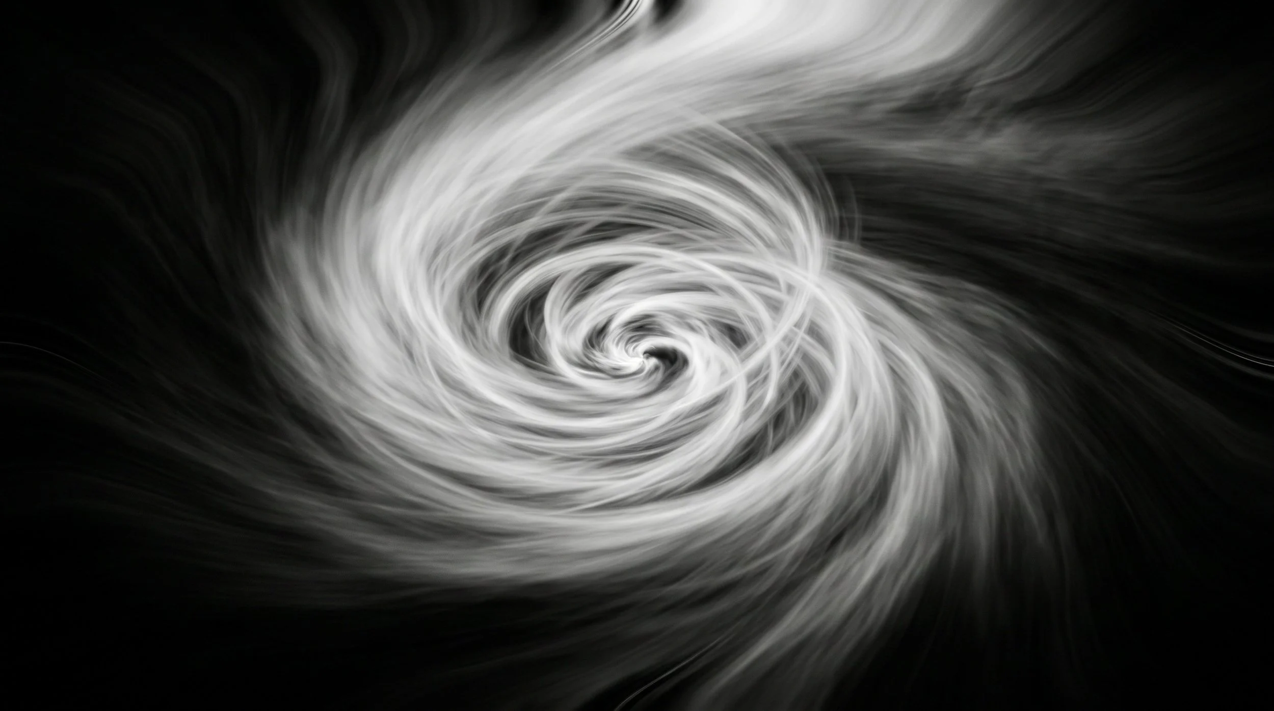 Abstract black and white geometric artwork representing chaos and form.