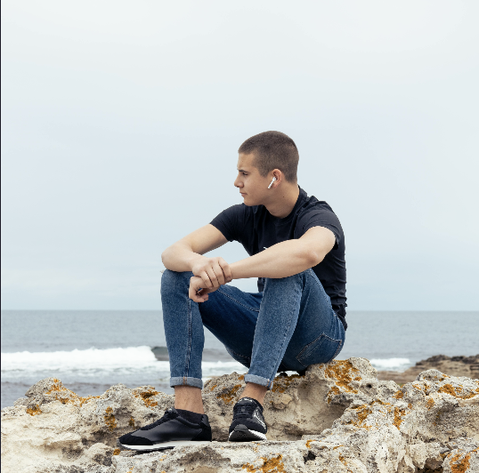 a man alone by the beach