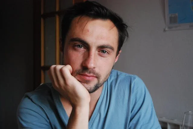 a man looking at the camera