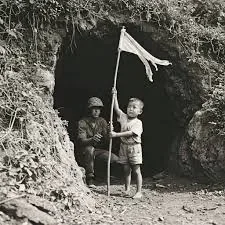 Okinawa boy waving a white flag in the battle of Okinawa