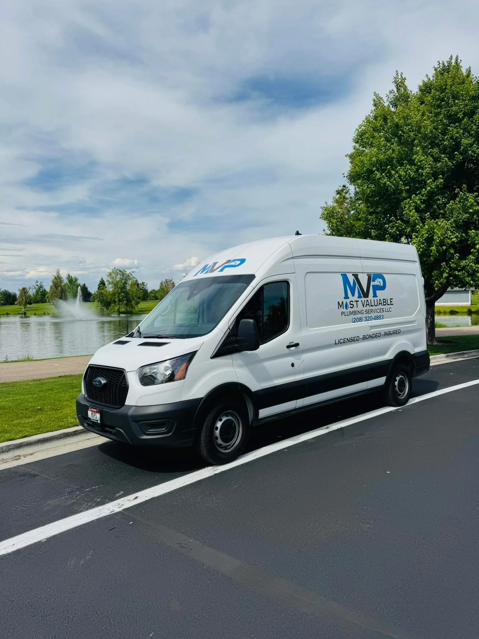 White plumbing van stocked with tools and parts to get the job done near me.