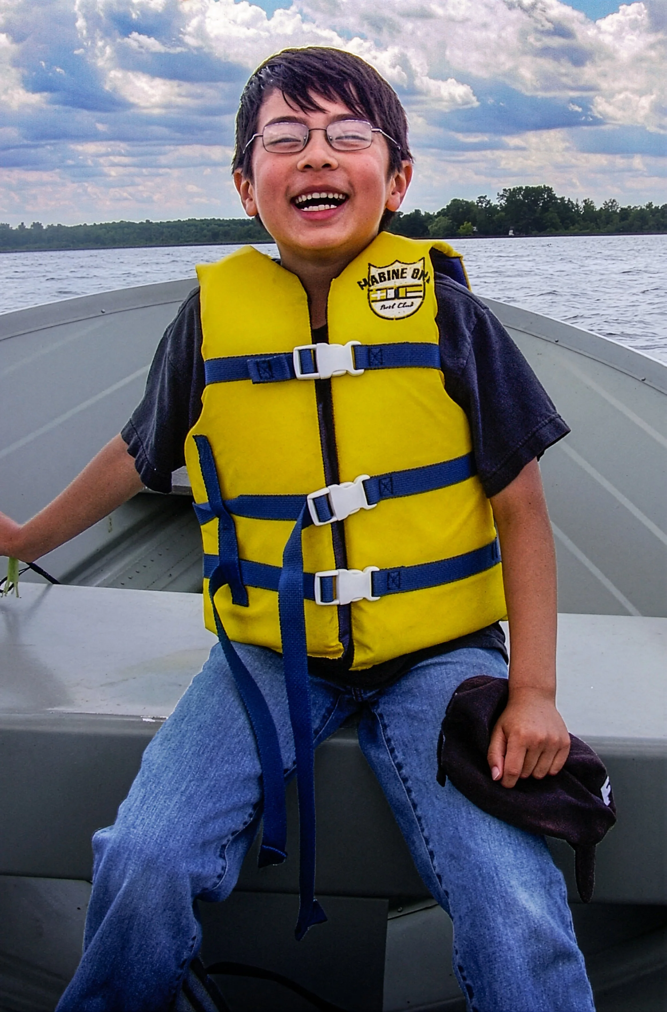 Brennan in a boat 8 yrs old.jpg